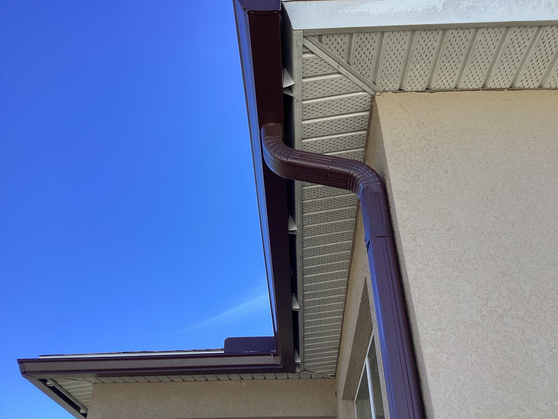 Royal Brown Seamless Gutters in Cape Coral FL by Gutter Professors