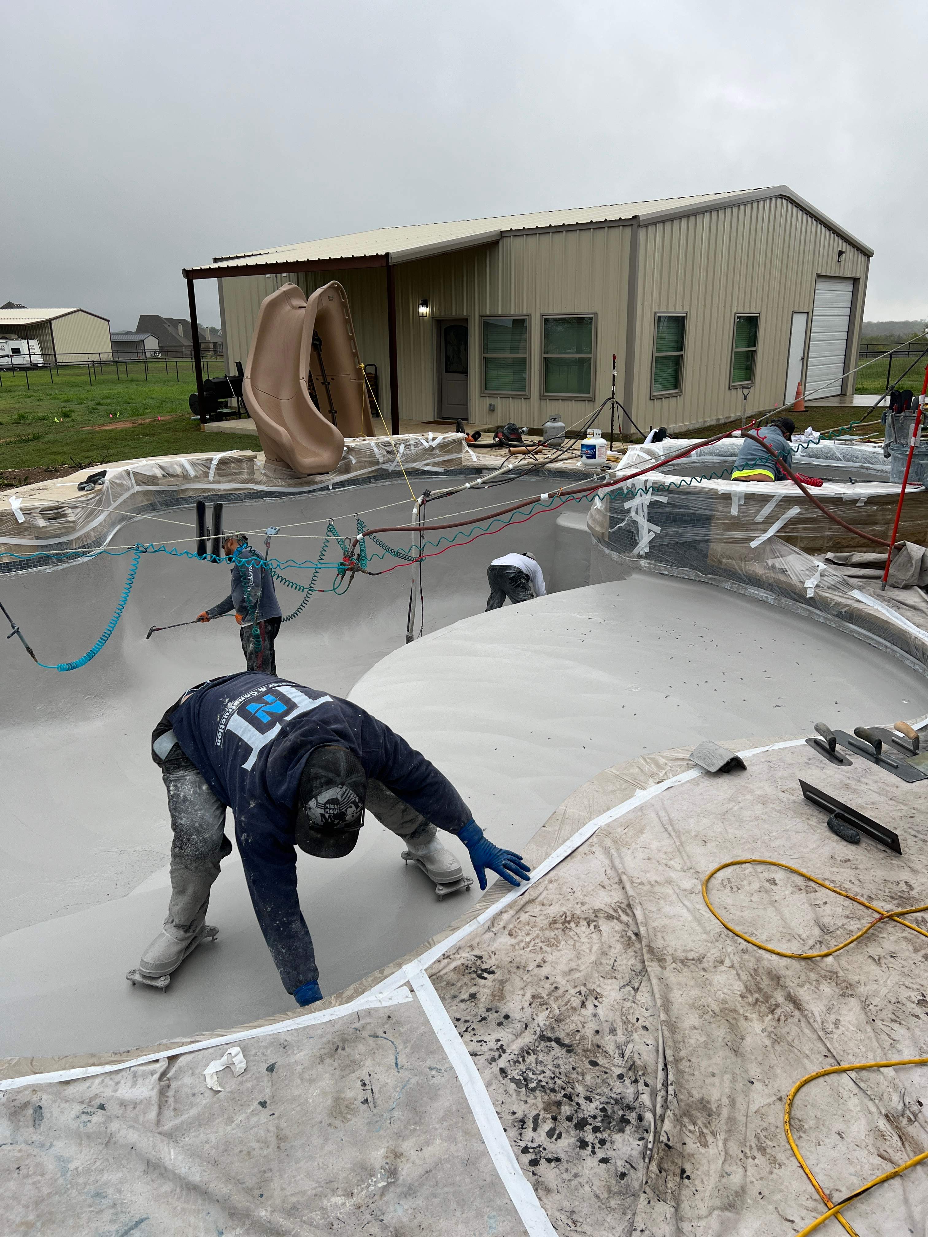 Freeform Pool with Raised Spa and Tanning Ledge by Pinnacle Pools and Spas - DFW