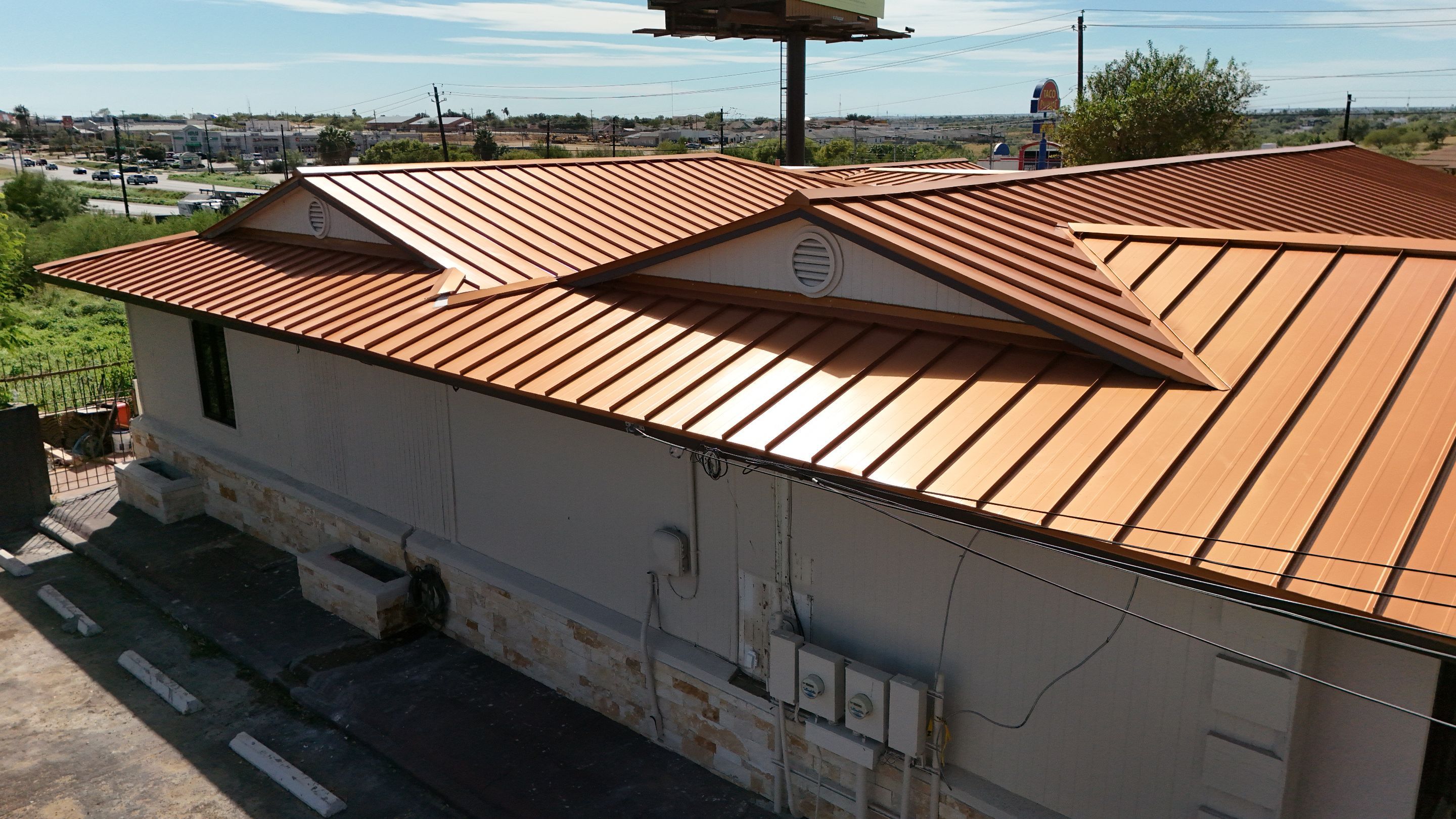 Copper Standing Seam Metal Roof Installation for Laredo Medical Clinic by JM Flores Roofing & Construction, Inc