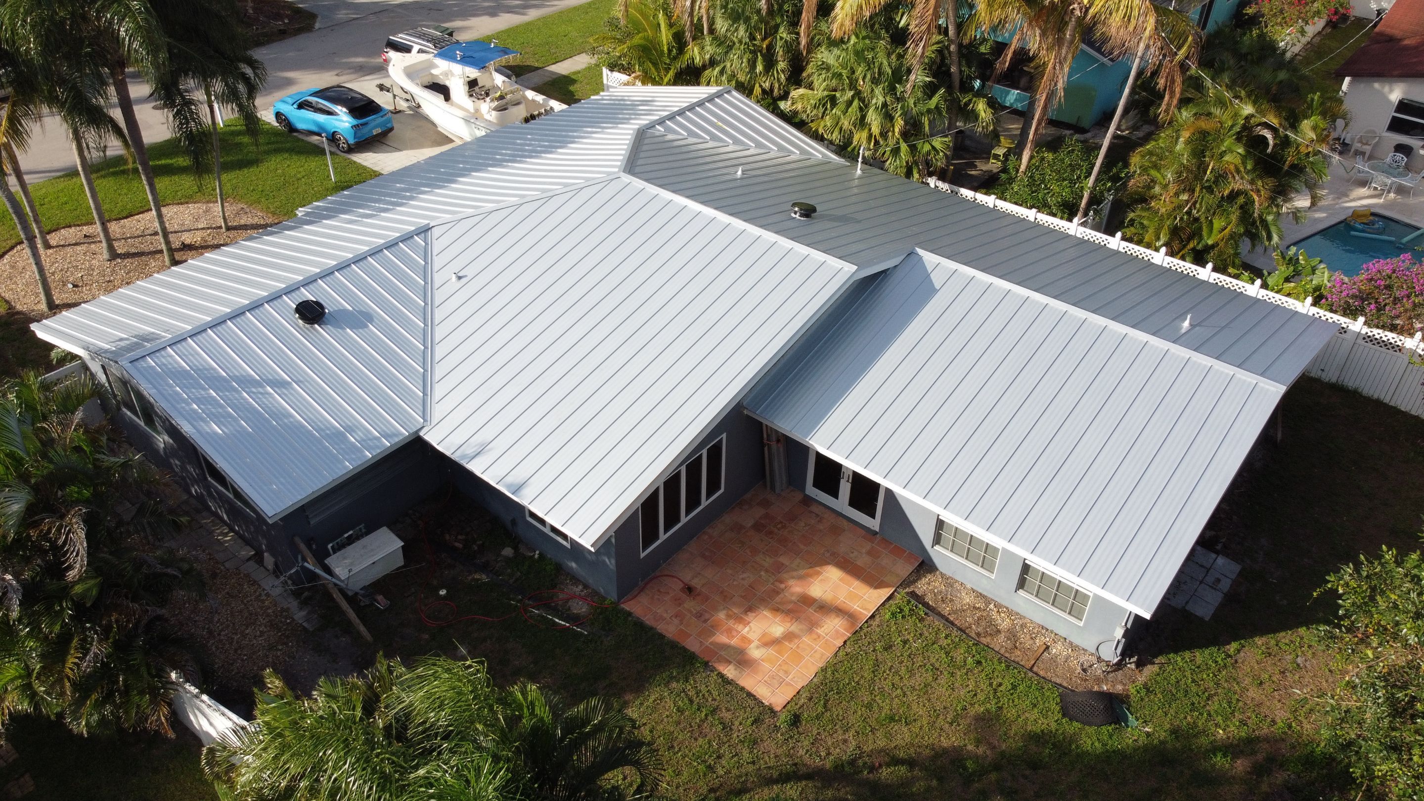 Residential Roofing Installation using 1" Nail strip metal roof by BLUES BROTHERS CONSTRUCTION CORP