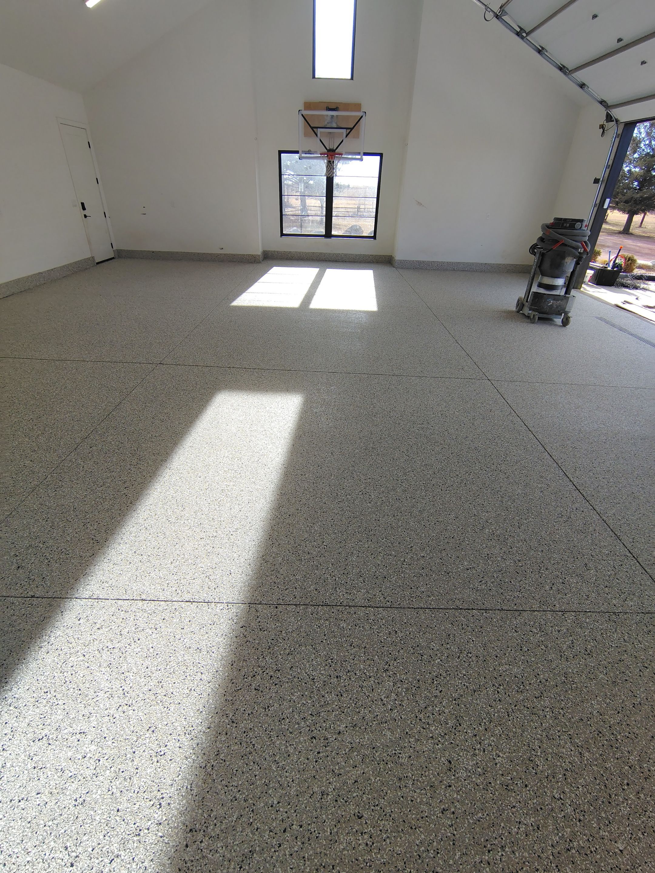 Epoxy Flake Garage Floor and Stair Coating in Sioux Falls by Select Painting, Coatings & Garage Cabinets