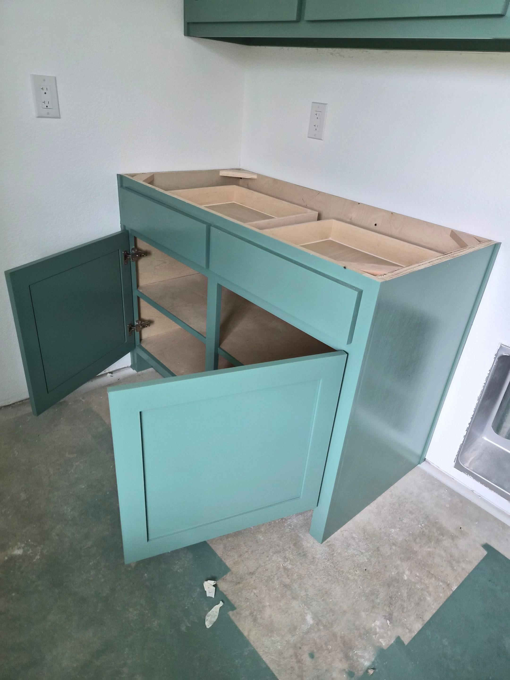 Sage Green Cabinet Transformation in Brownsboro, TX! by Quality Coats Painting