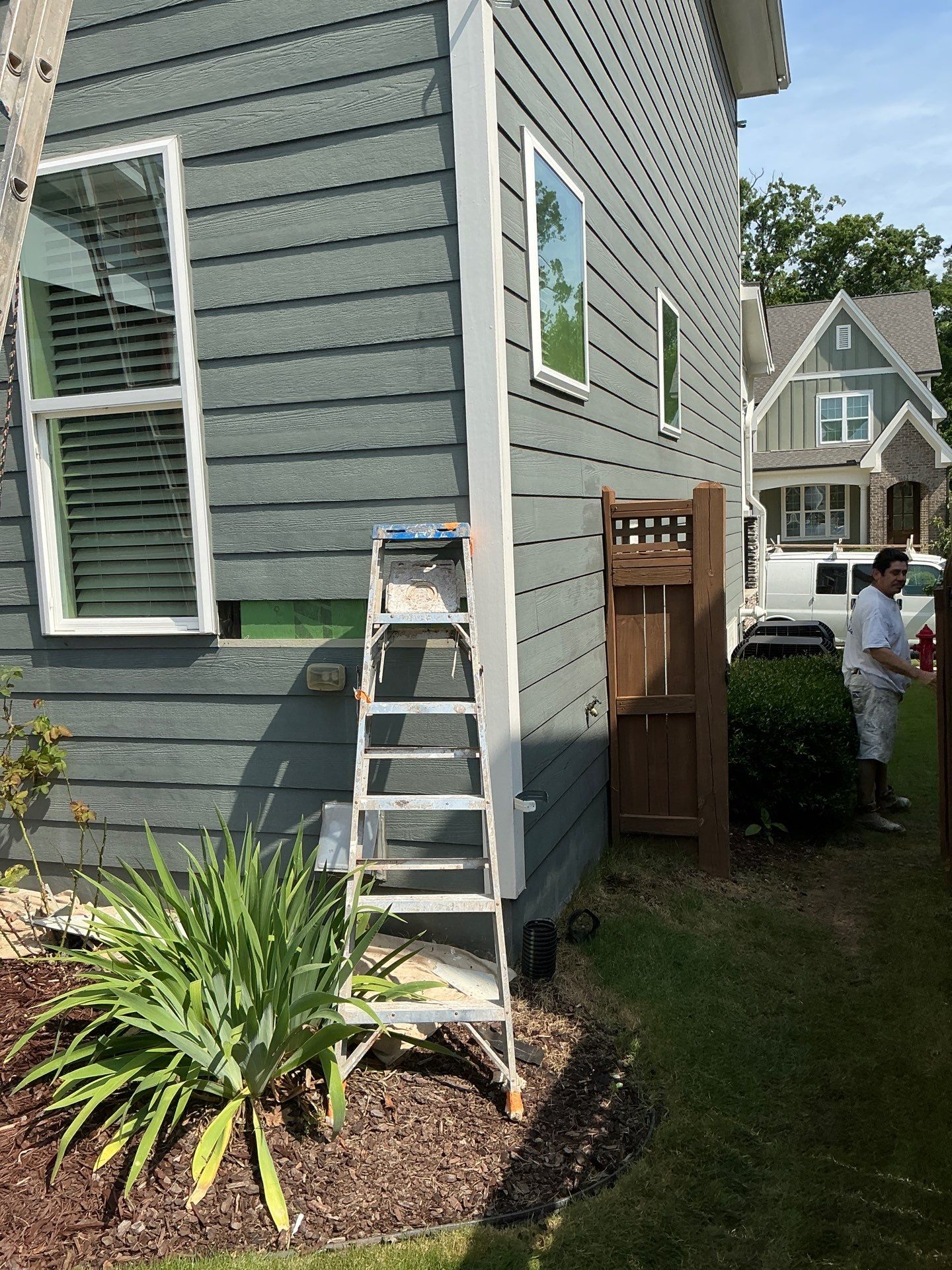 Siding replacement and exterior painting by GonzalezPainters & Contractors Inc
