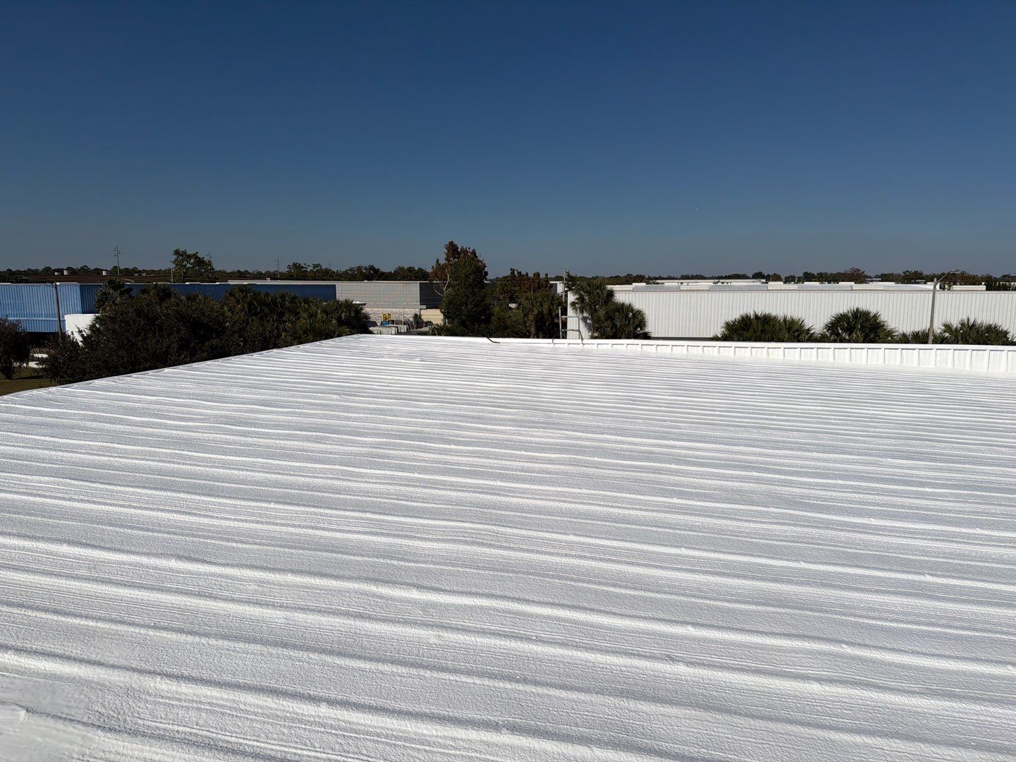 Orlando Commercial Metal Roof Restoration and Silicone Coating System by CES Roofing