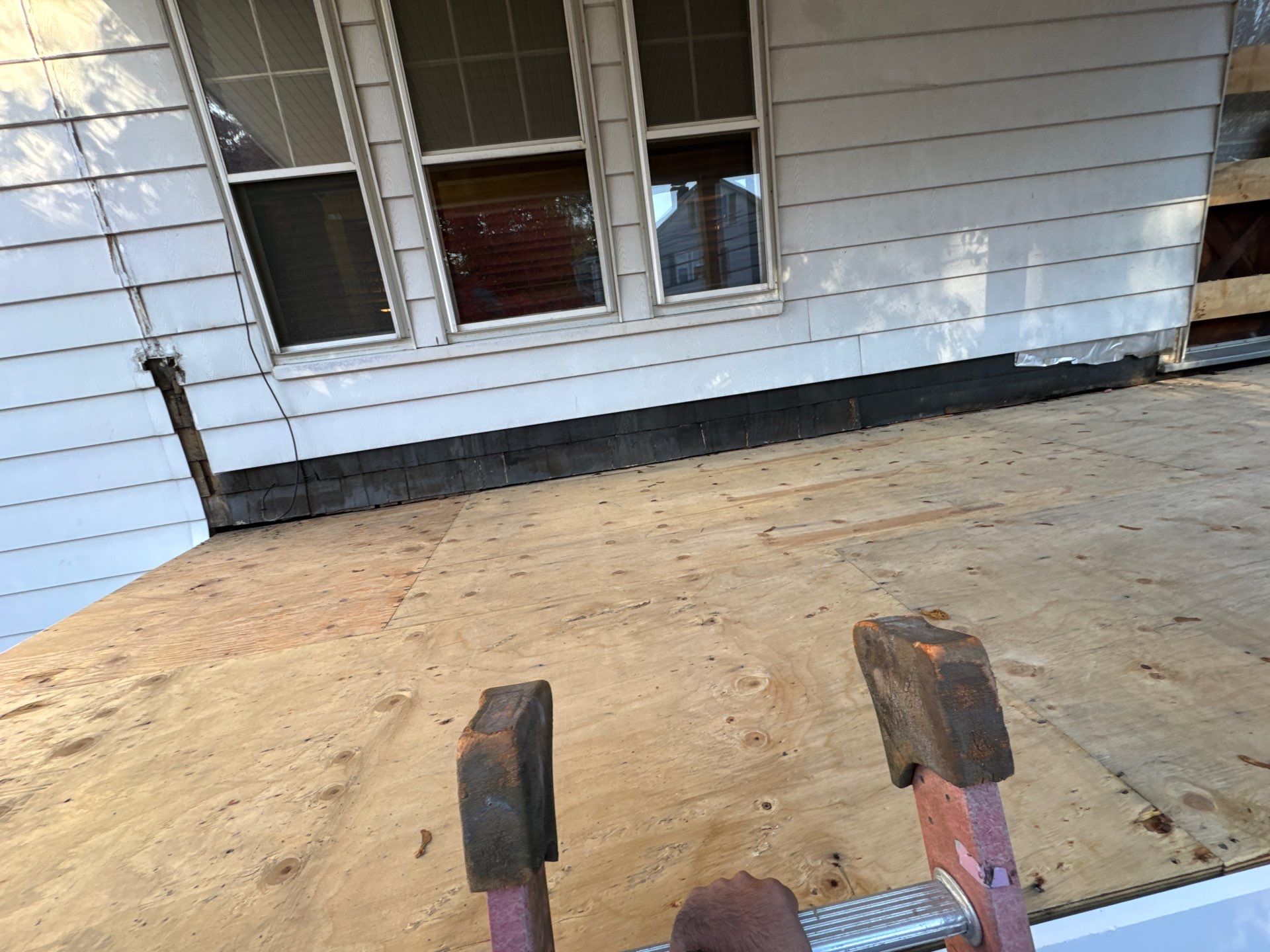 Watertown Porch EPDM Rubber Roof Installation by Mighty Dog Roofing of Greater Middlesex County