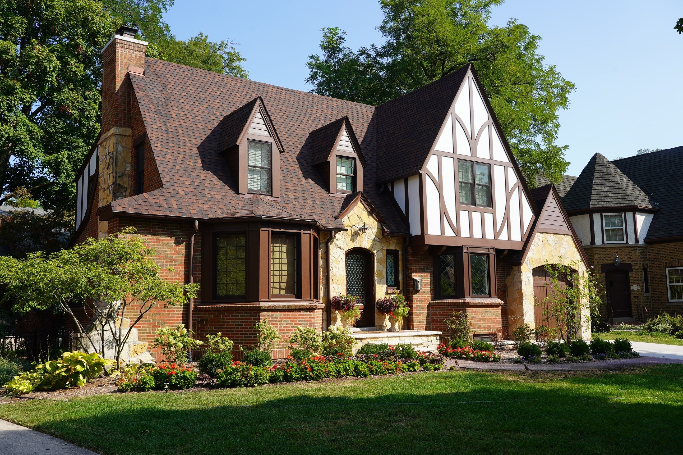 Tudor-Style Hardie Exterior Renovation in Elmhurst by Great American Exteriors