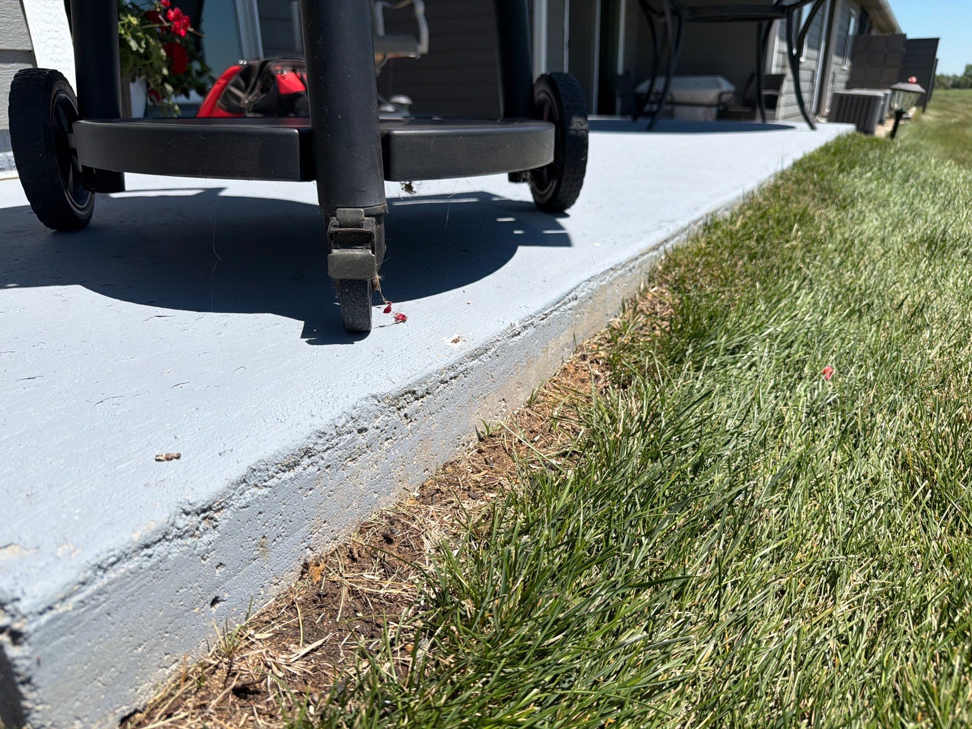 Starry Evening Concrete Patio Coating Installation in Tea by Select Painting, Coatings & Garage Cabinets