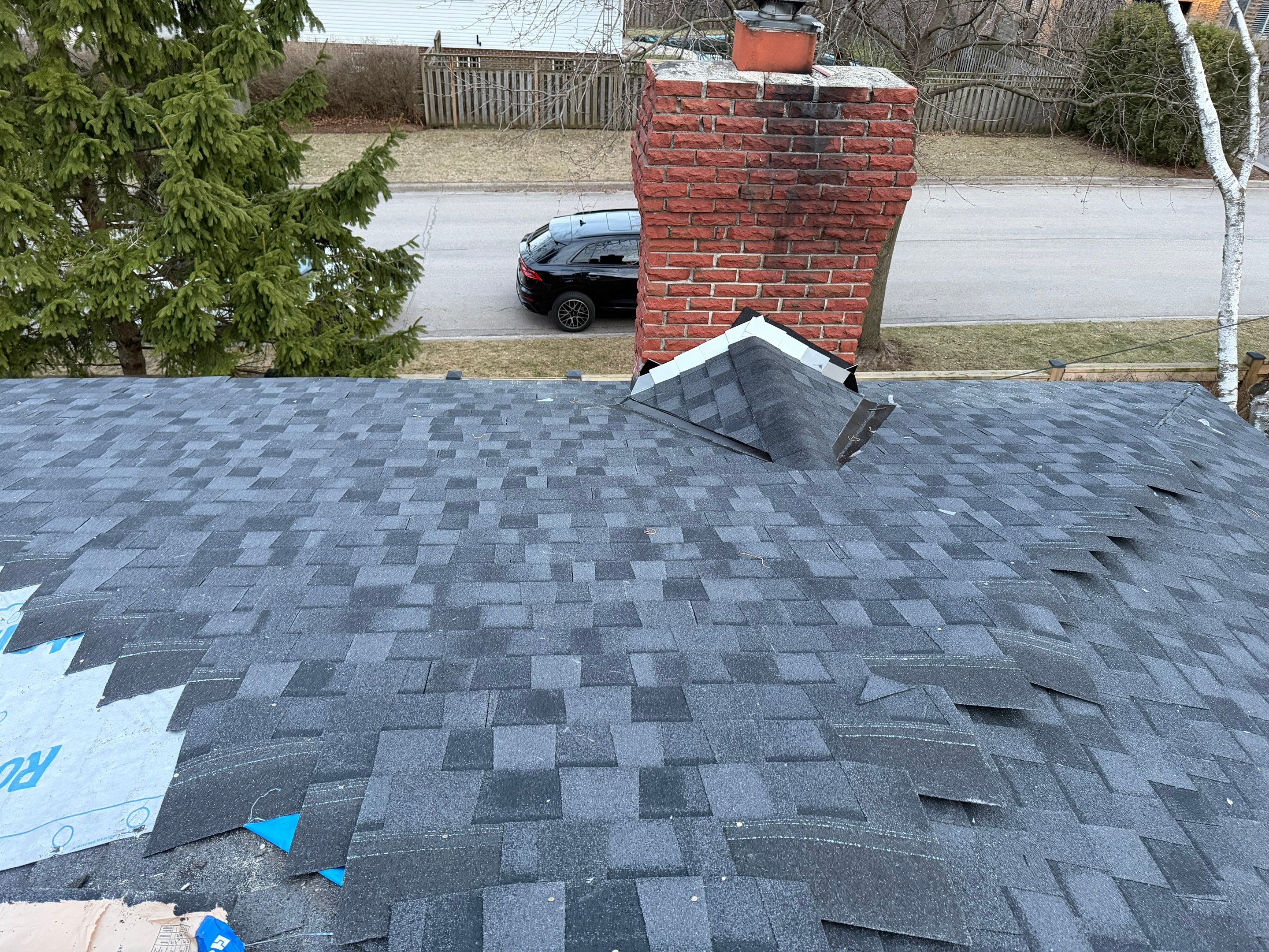 Project in Burlington by The Roofing Crew