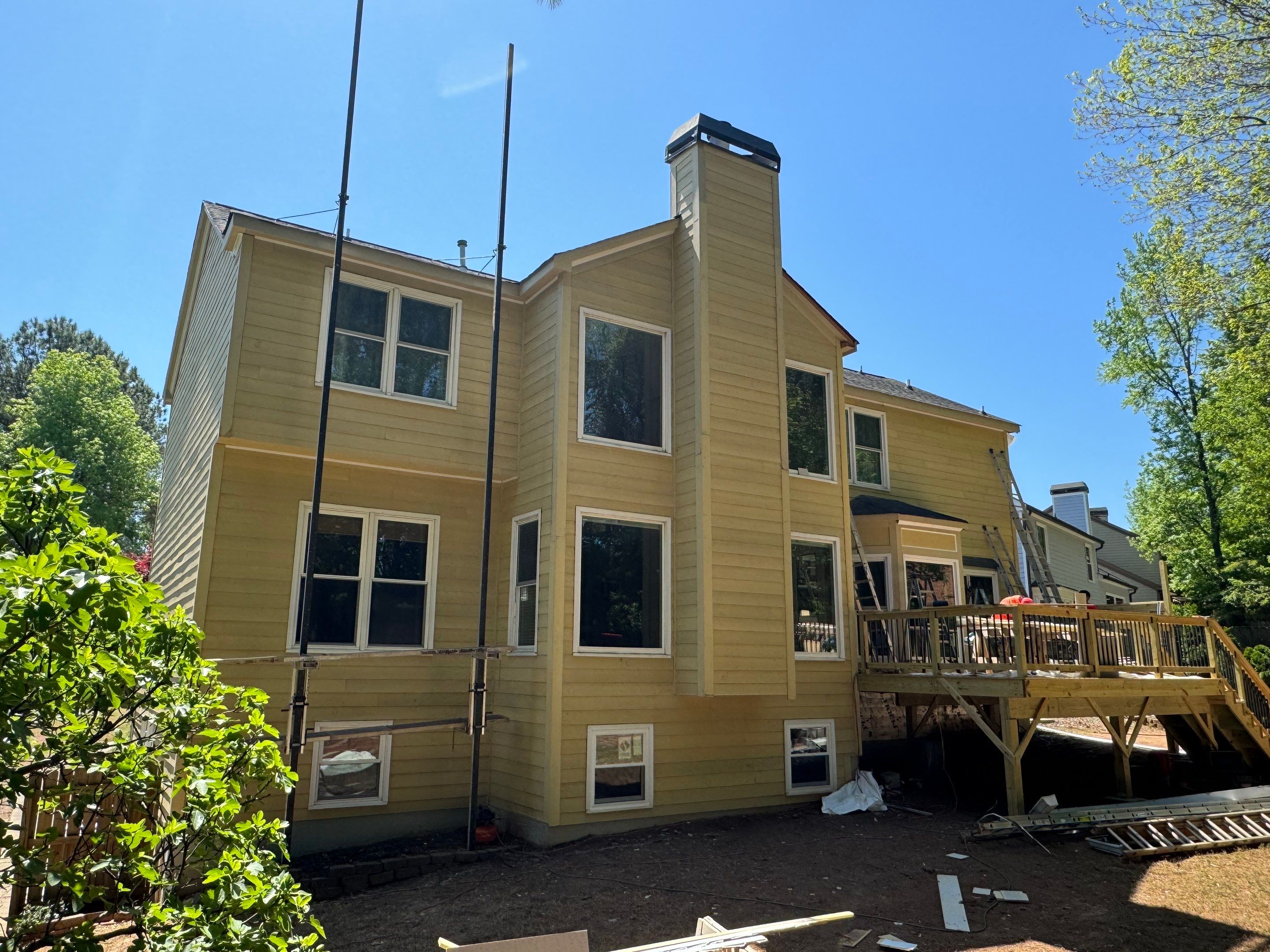 Full Exterior Siding Replacement and Custom Deck in Johns Creek by Swift Home Renovations 