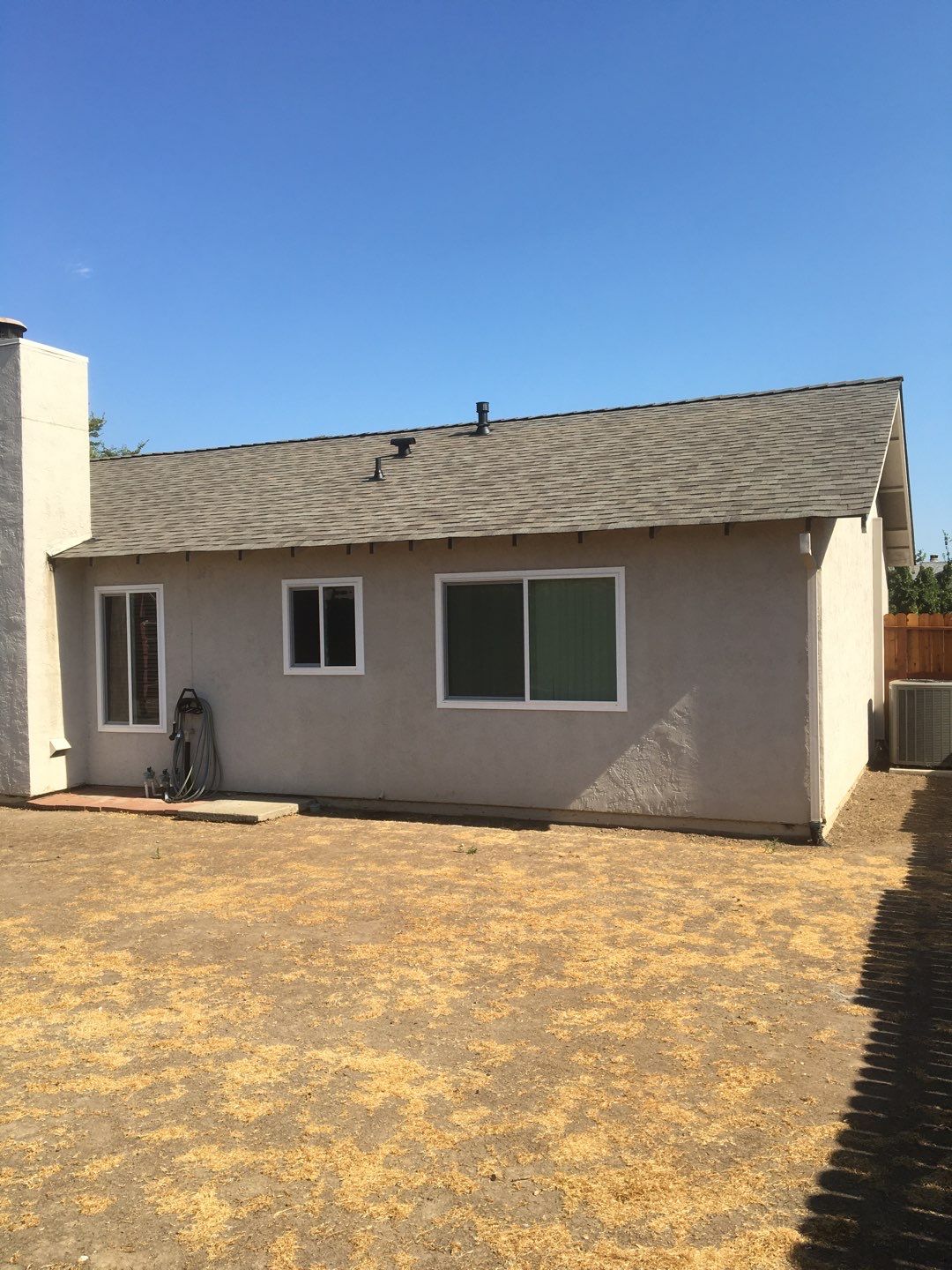 New Roof and Gutters adds value to this home by Byers Enterprises 