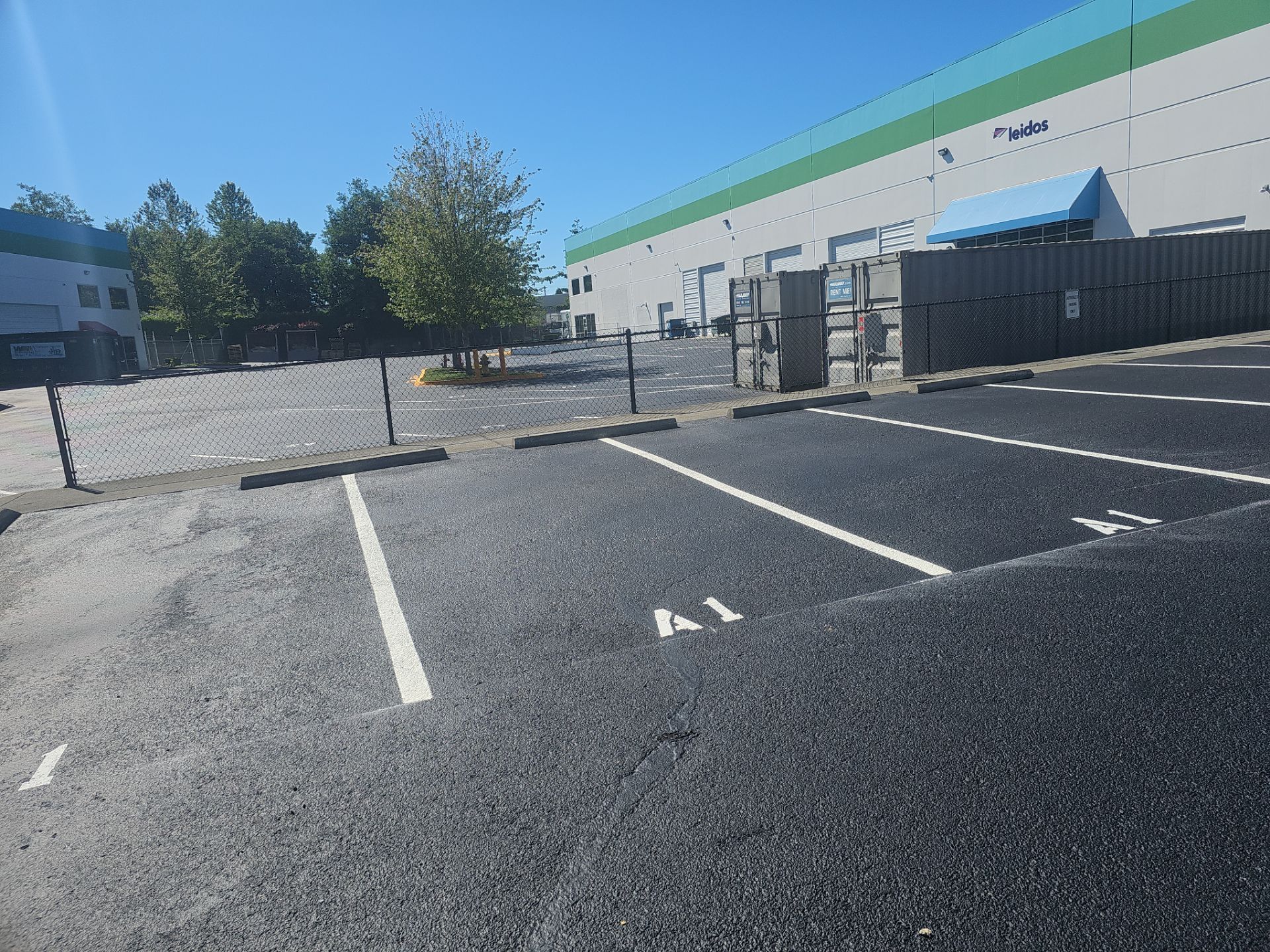 Commercial Sealcoat & Asphalt Patch Repair | Lynnwood  by Jireh Asphalt & Concrete Inc 