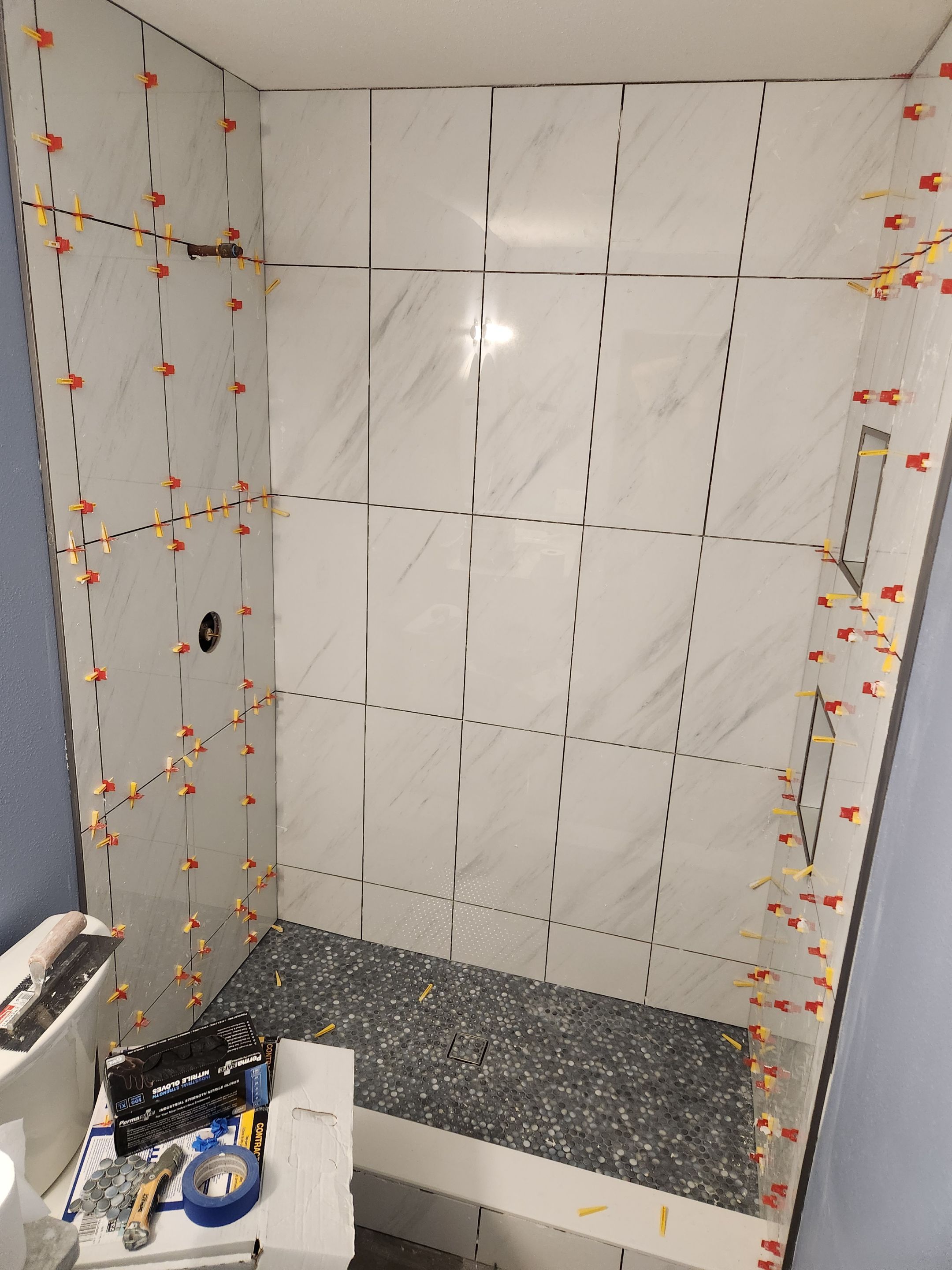 Austin Bathroom 2 and a half Remodel Featuring Tile and Custom Niches by RejuveNate Renovations LLC