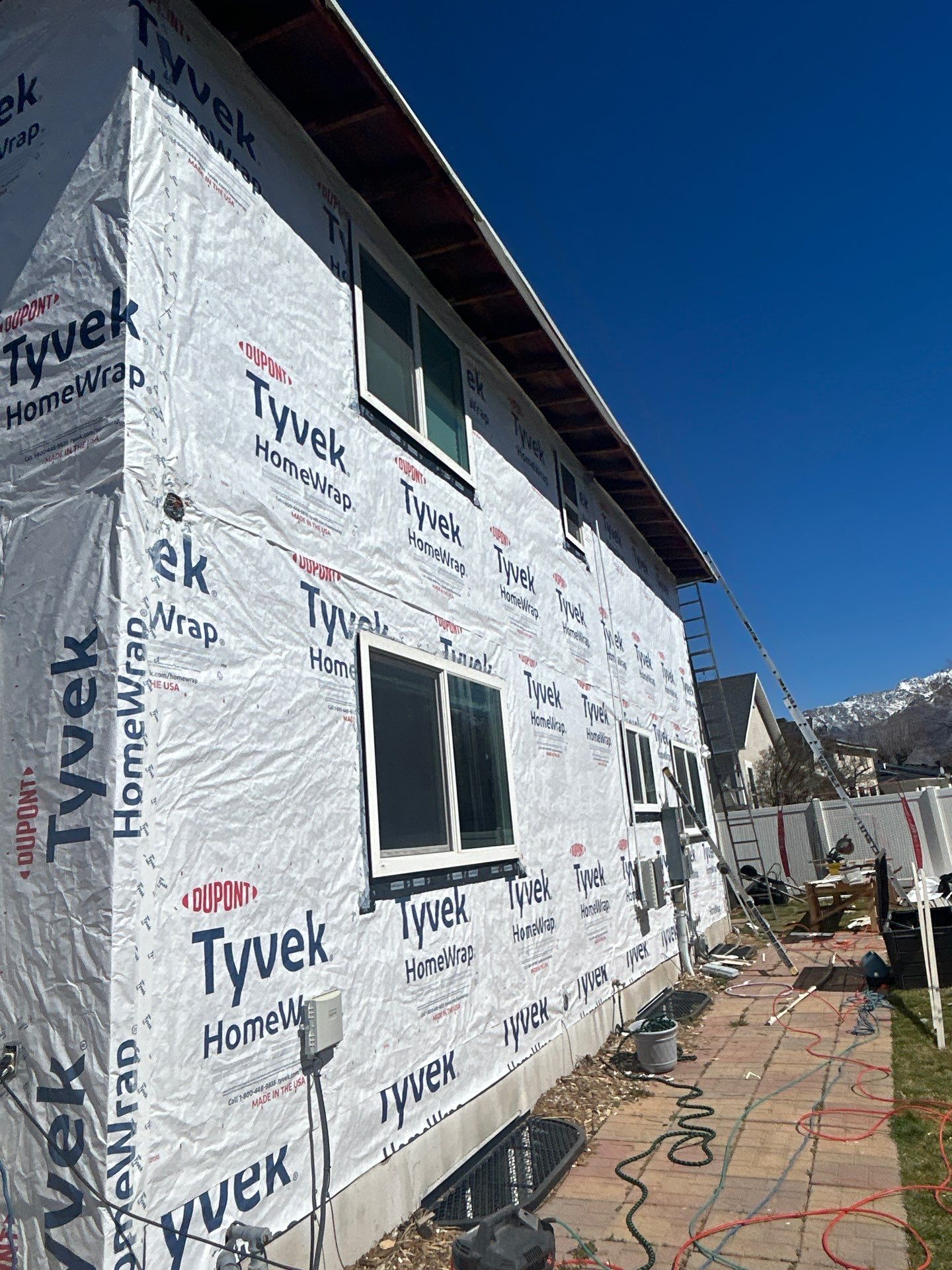 Sandy | Strategic Hardie & Vinyl Integration | Cobble Stone & Desert Sand by Ideal Siding Utah
