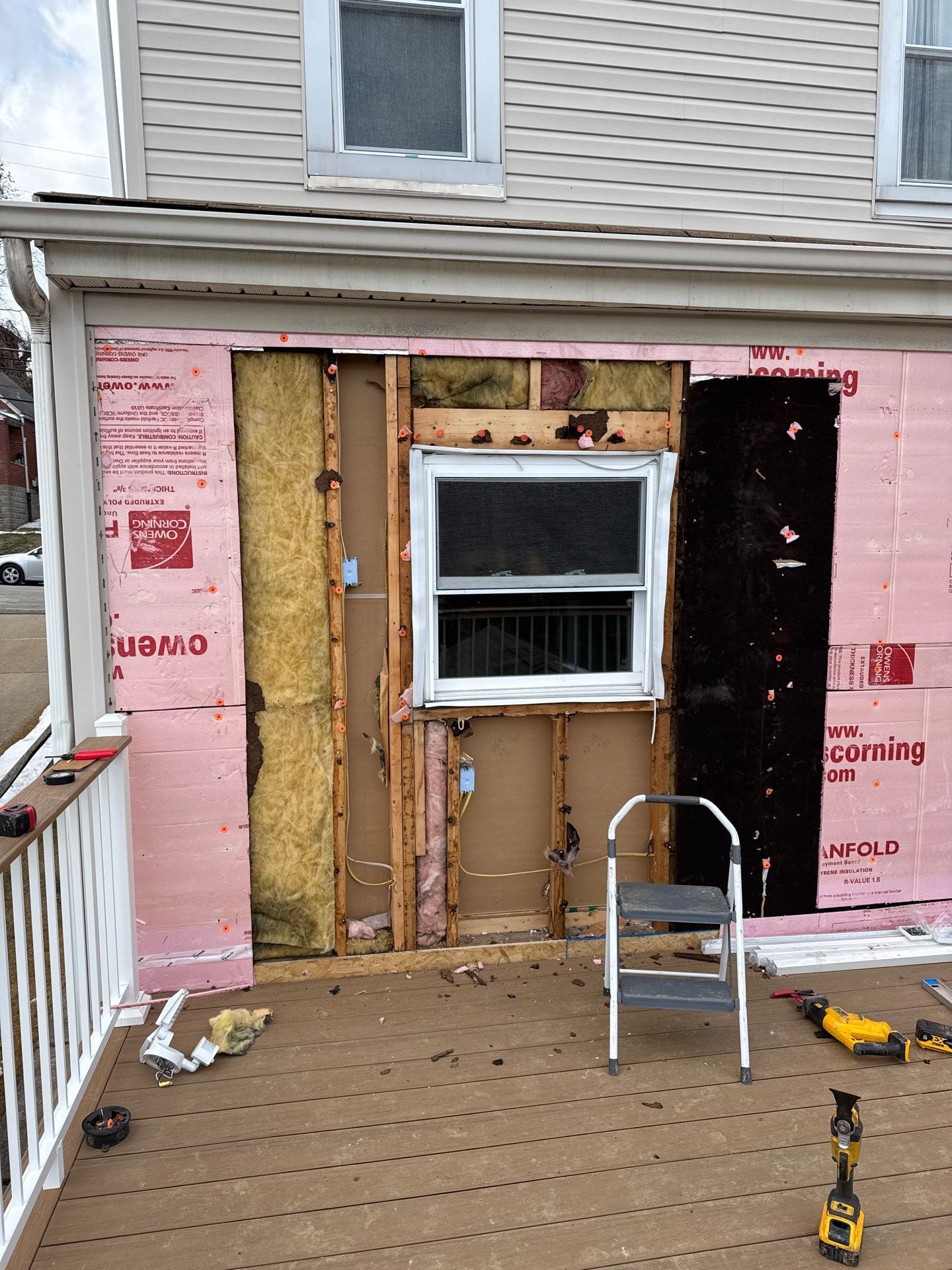 Deck and door by Cousins Roofing Siding & Decks