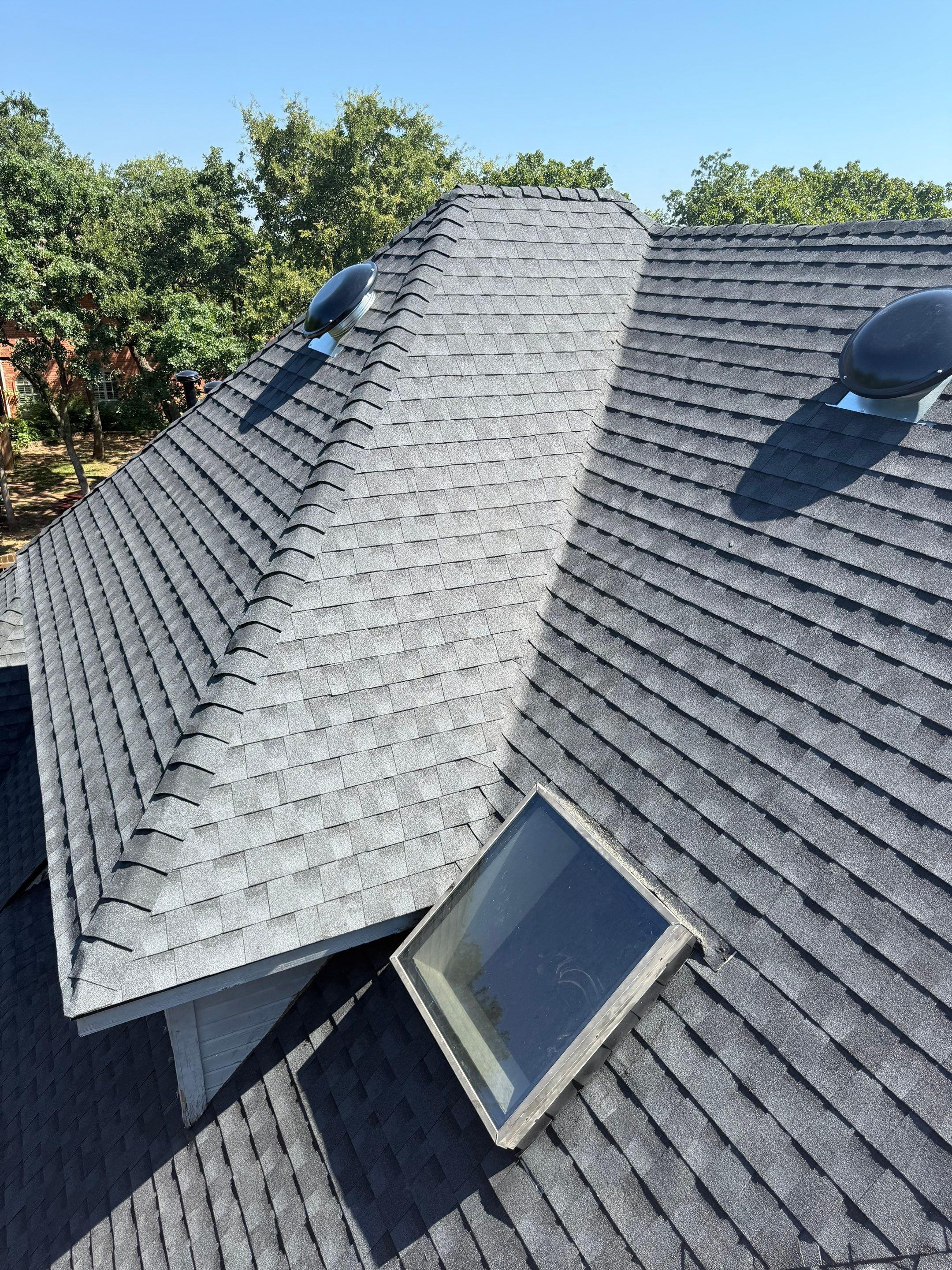 roof replacement & skylight repair in Edmond by McCann's Roofing and Construction