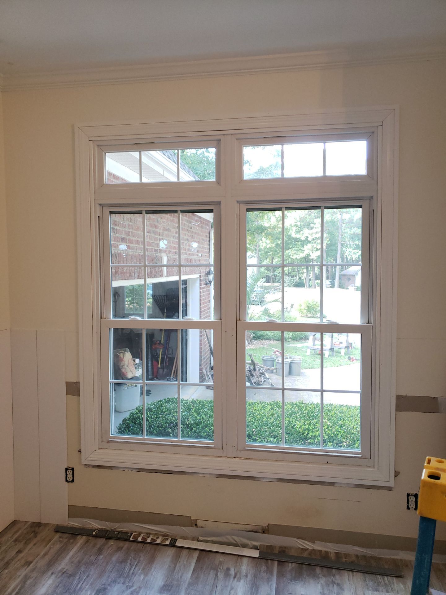 Front Room Transformed into a Waterproof Pet Room by A Step Above Handy LLC 