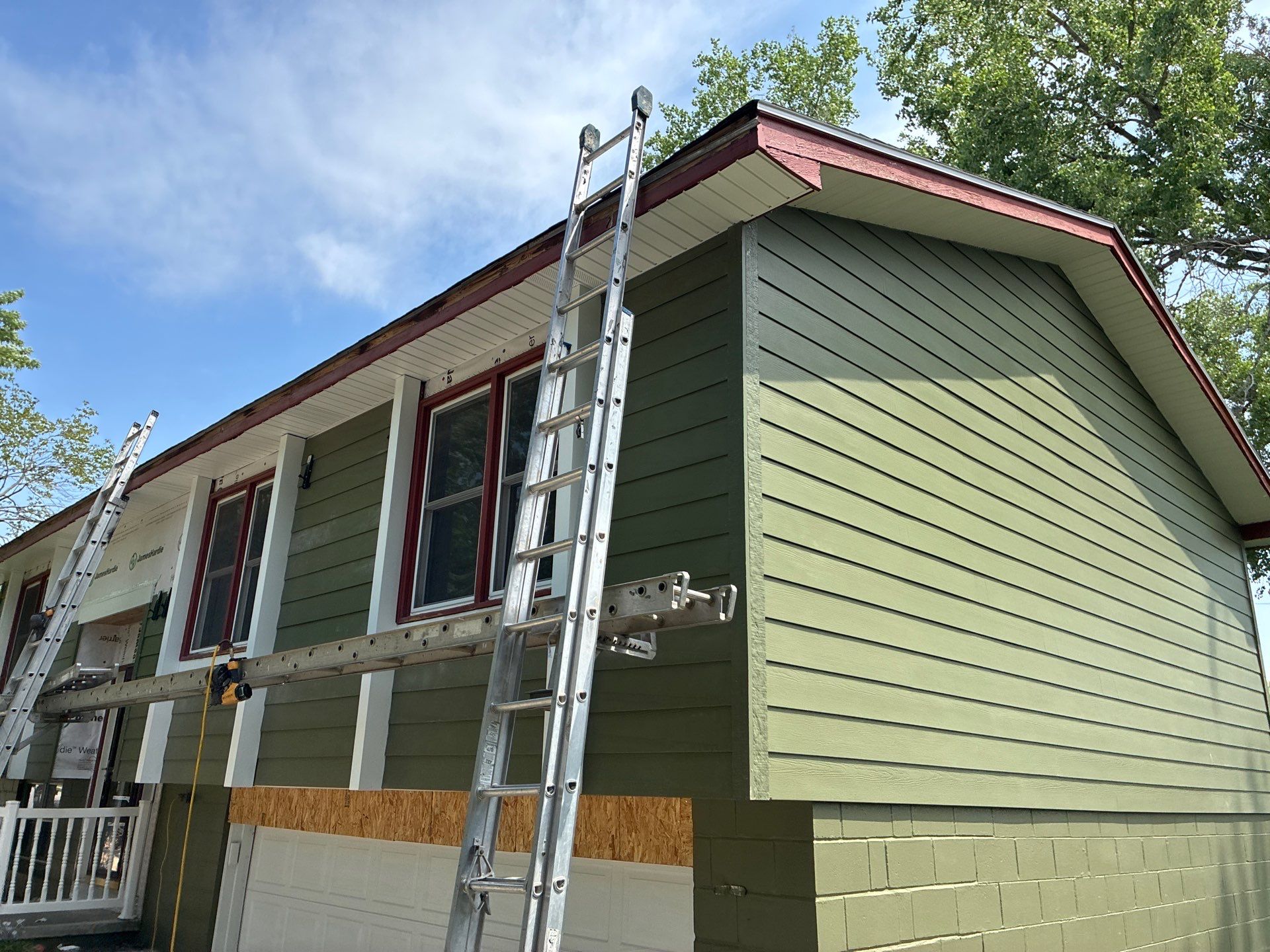 James Hardie Siding Replacement in Omaha with Mountain Sage Finish by Carps Complete Exteriors