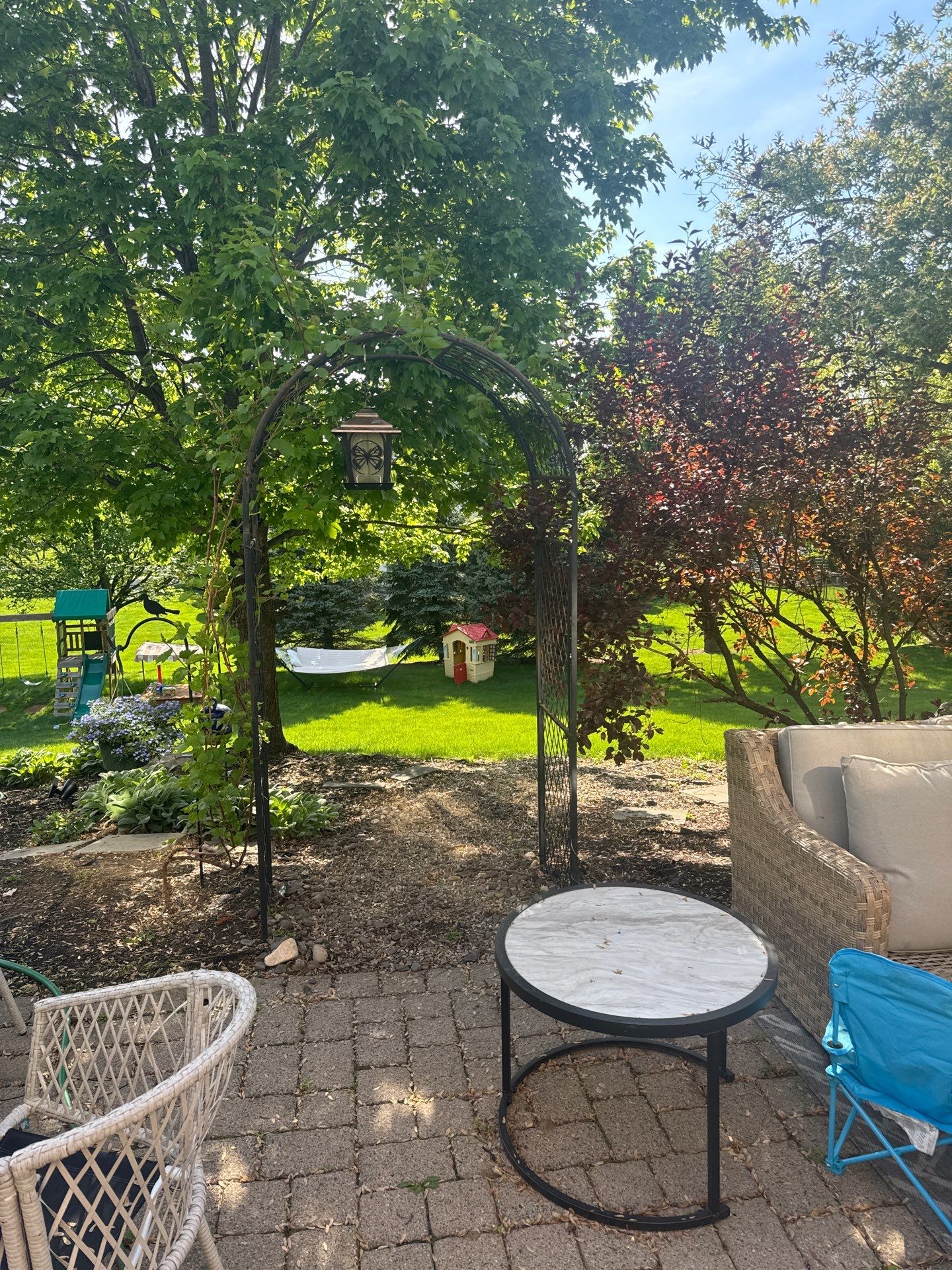 Backyard Retreat: Techo-Bloc Patio + Firepit Lounge by Saylor’s Lawn & Landscape