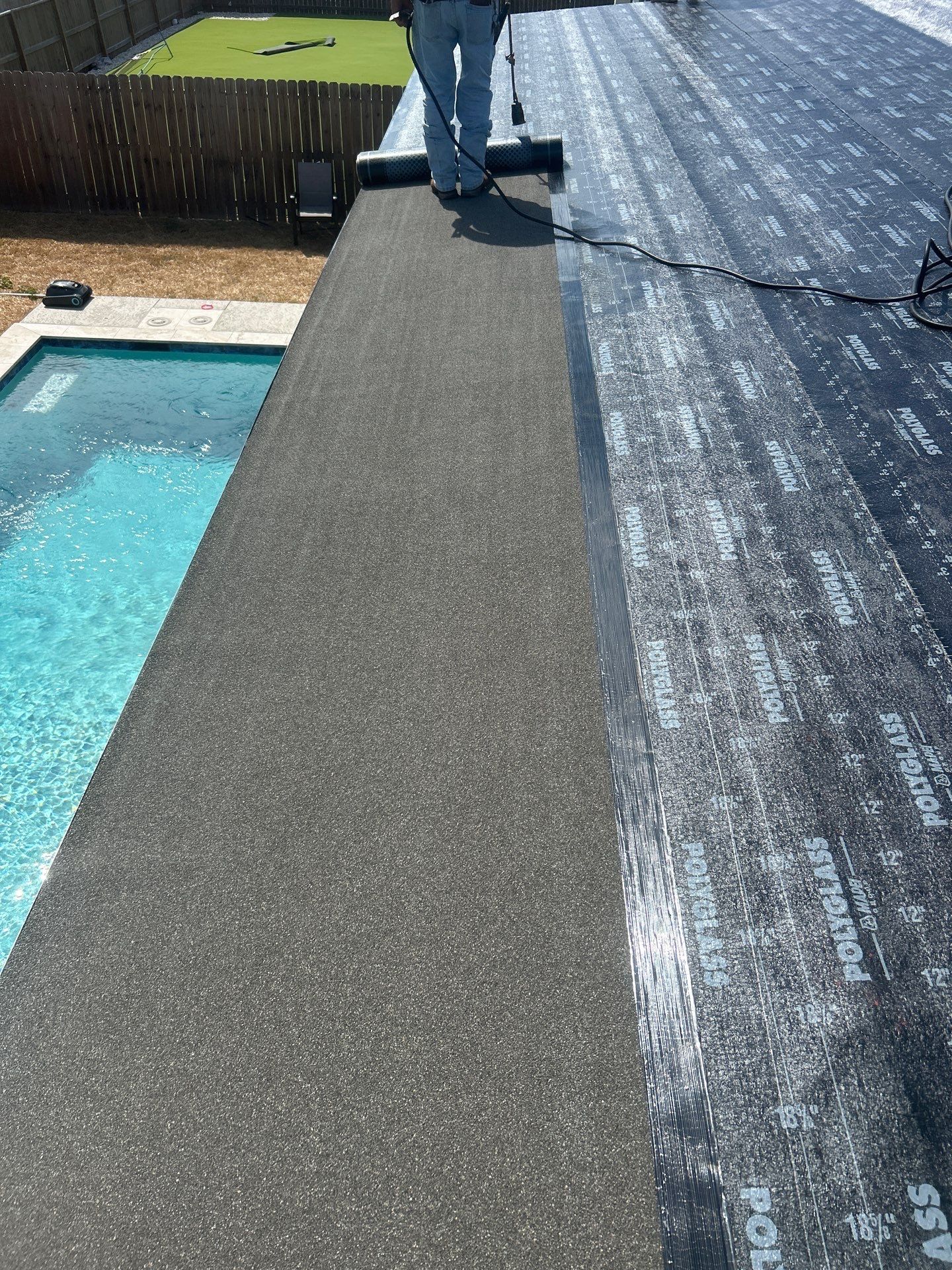 Patio Pool Cover by Bayfront Roofing and Construction