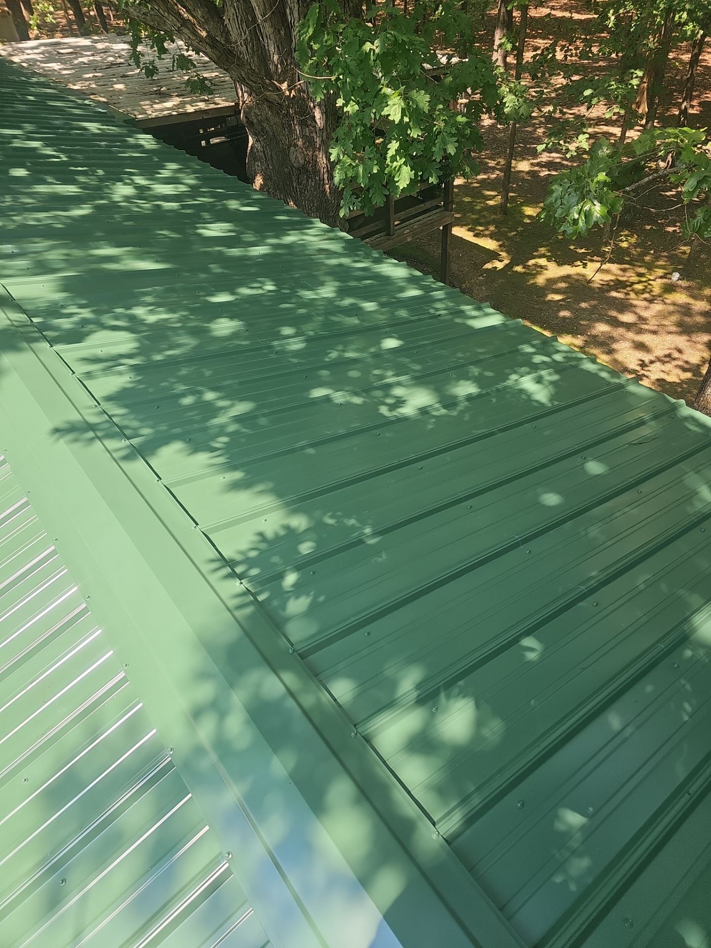 Residential Roofing Install - 26 Gauge G-Rib Metal - Color Evergreen  by Titan Commercial & Residential Roofing 