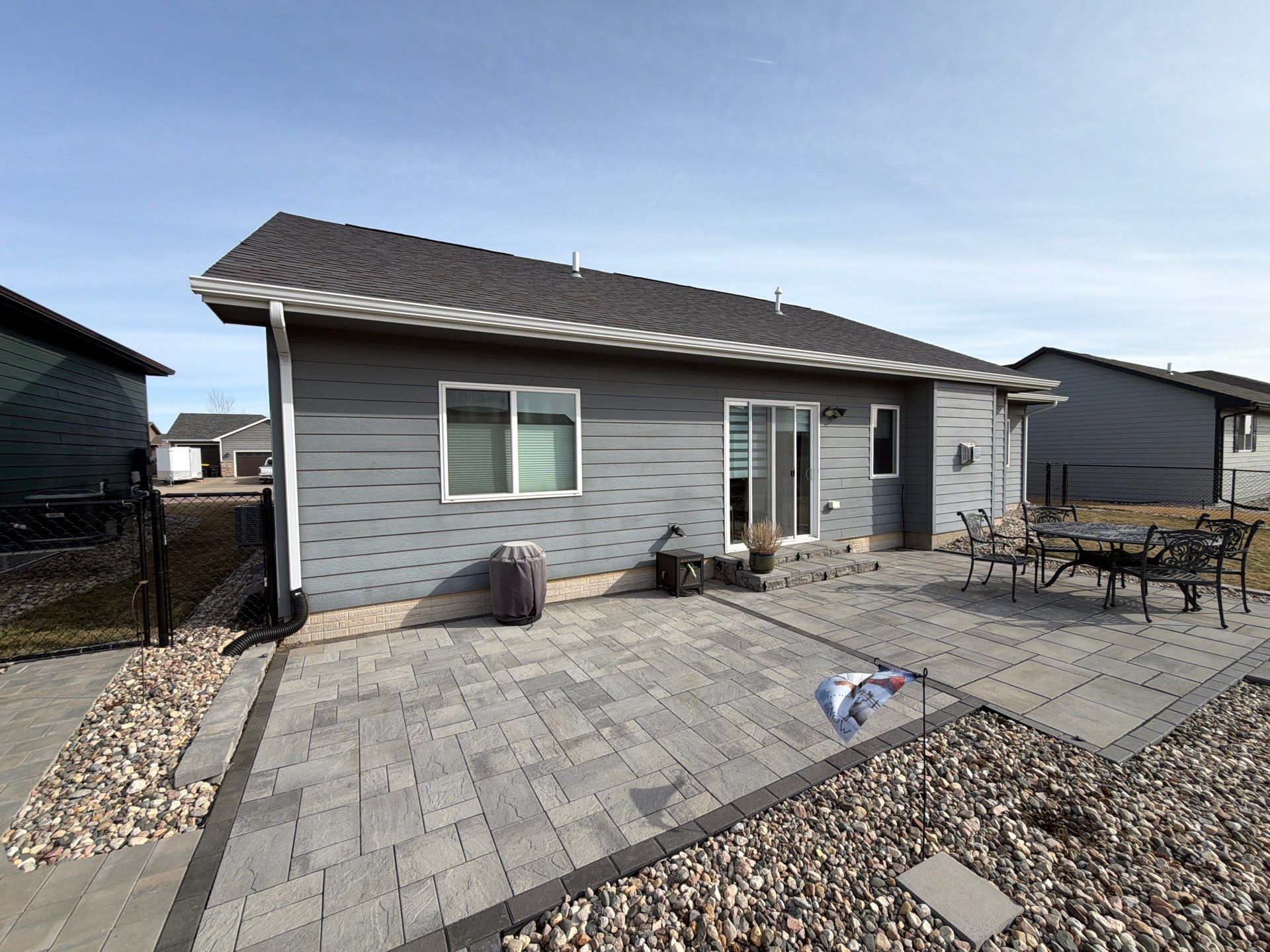 Residential Exterior Painting and Siding Refresh in Sioux Falls by Select Painting, Coatings & Garage Cabinets