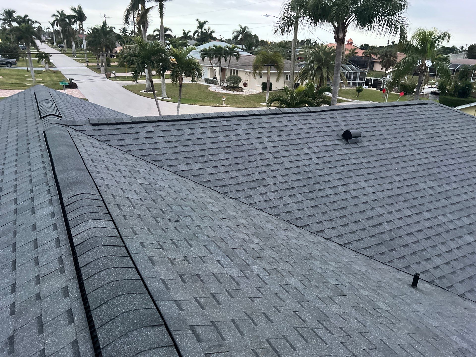 Residential Roofing Installation using Pinnacle Pristine Shingle in Pewter Gray by Durabilis Roofing INC