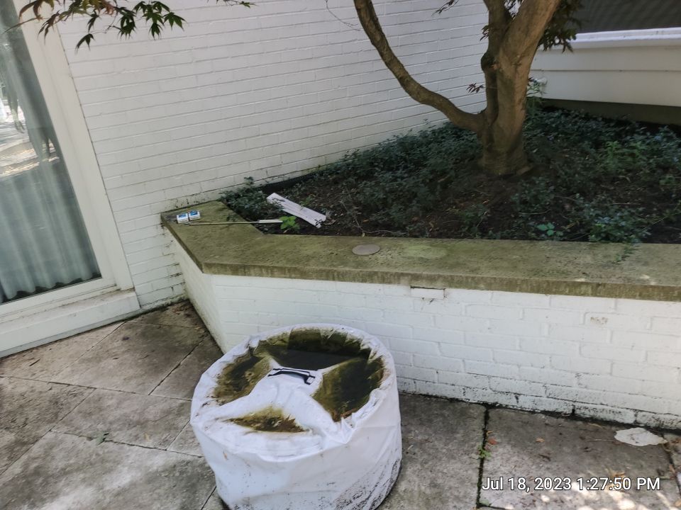 marble patio cleaning and sanding using Polysweep polymeric sand by Northern Power Washing LLC.