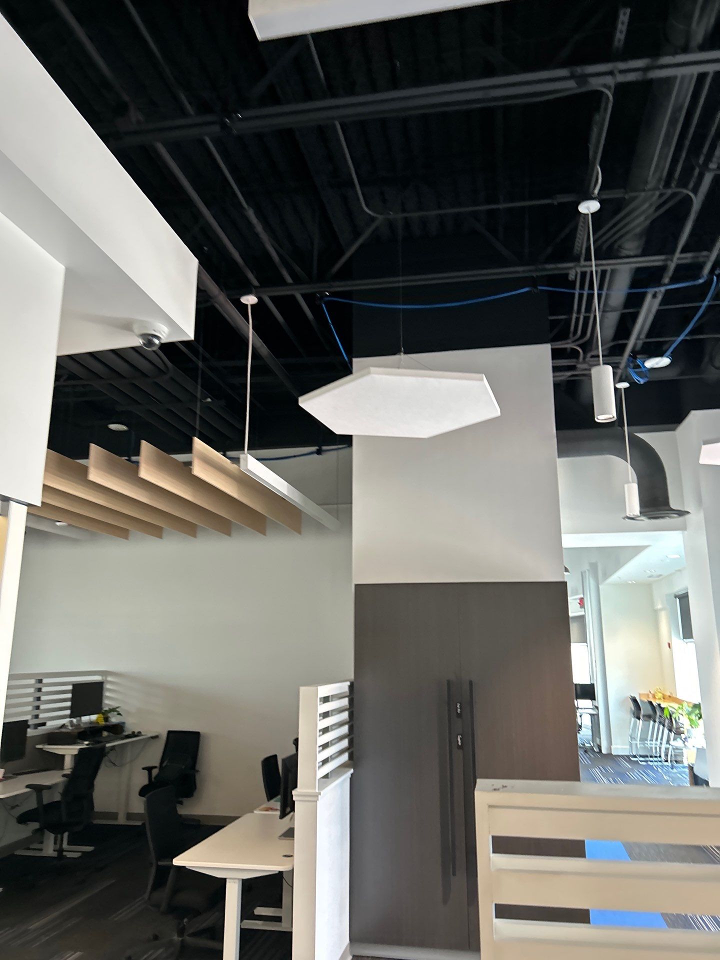 Office Remodel Featuring Acoustic Baffles and Professional Carpet Installation by CompanyCam Sales Demo