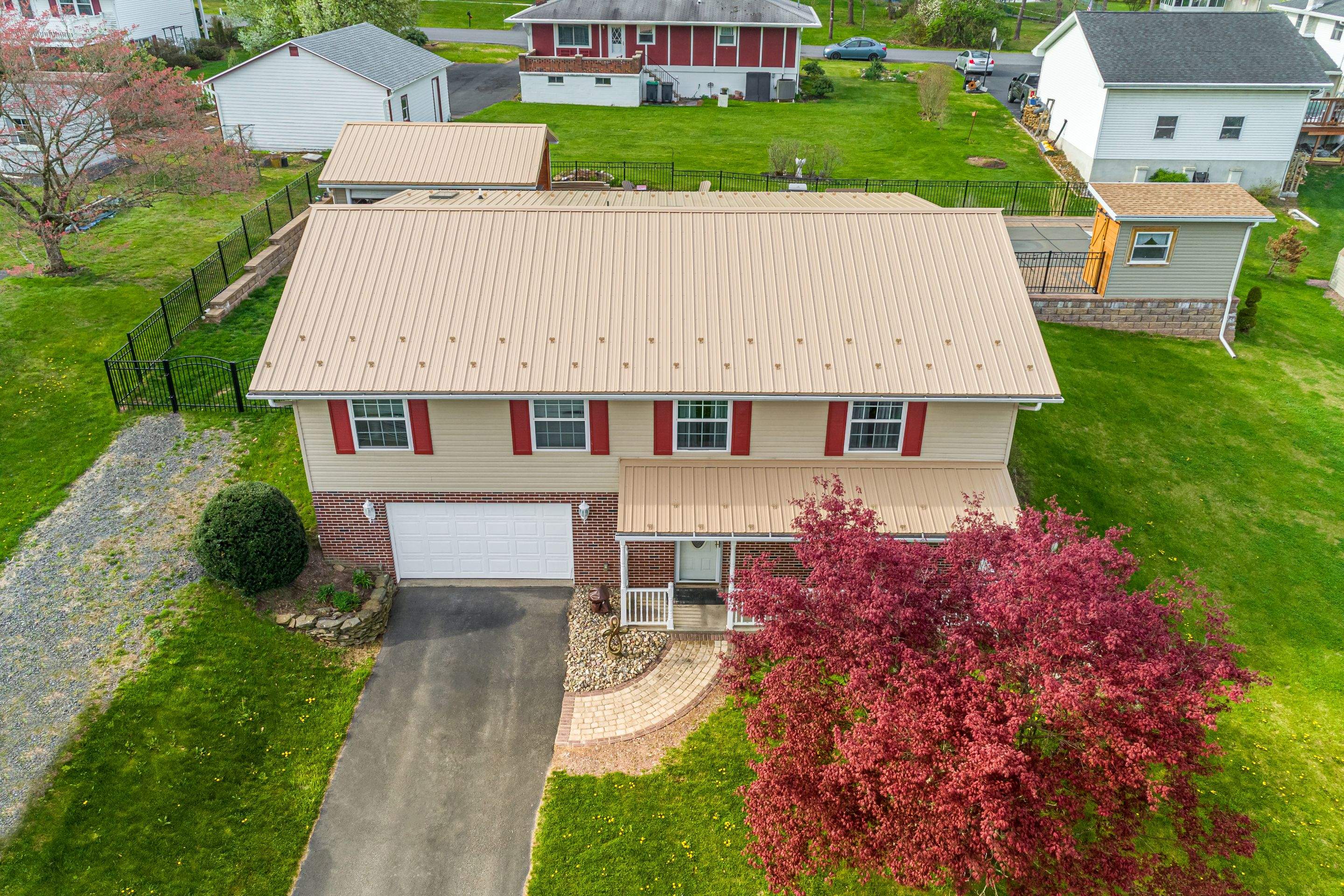 Metal Roof-tan by Esh Builders