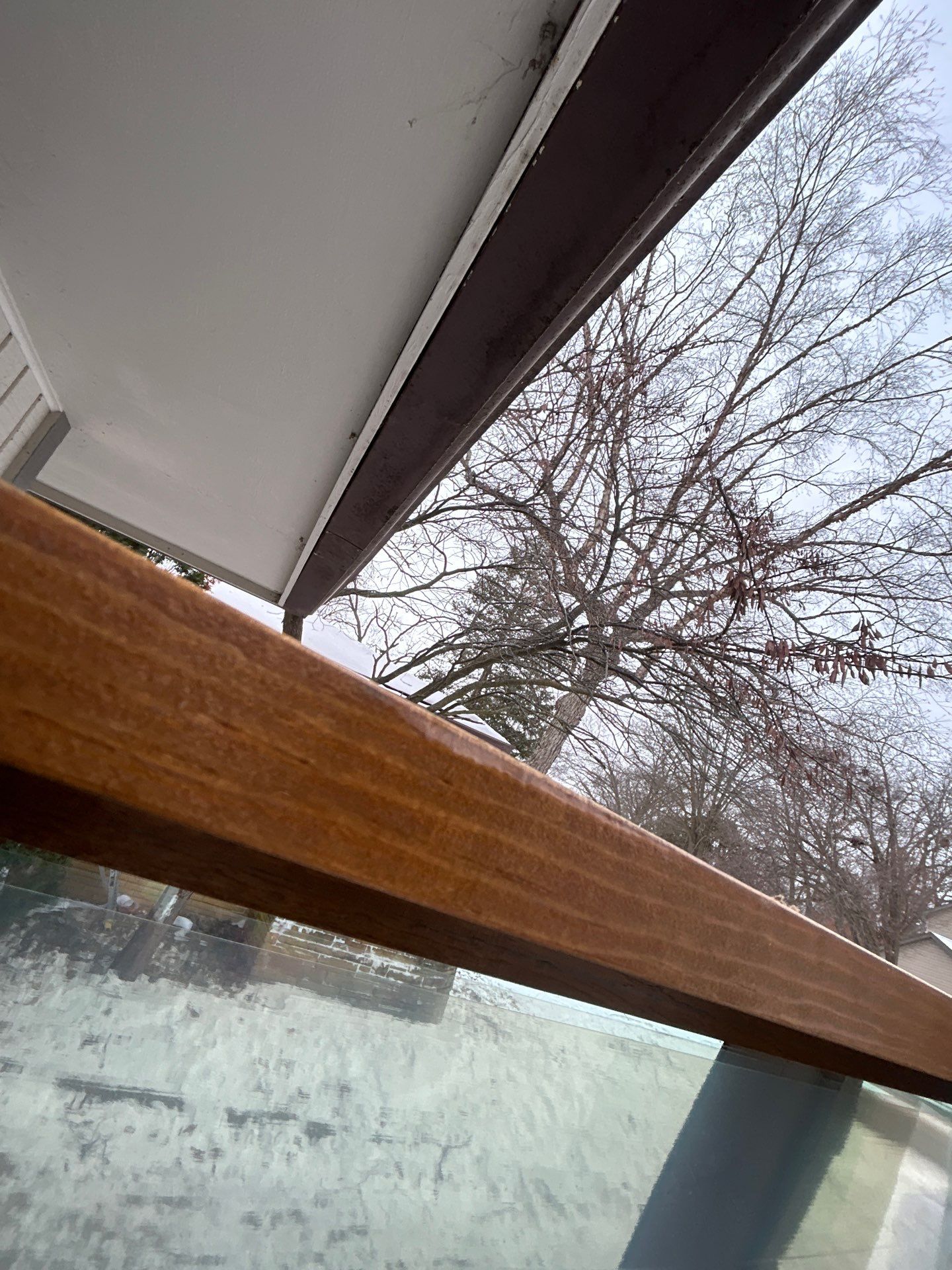 Black-Frame Pella Lifestyle Upgrade on a Partial Brick Home by United Windows and Siding LLC