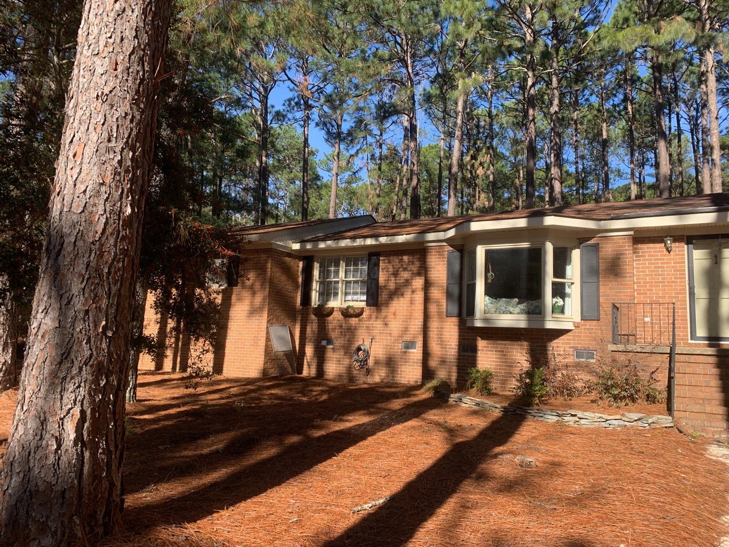 Re Roof by American Roofing NC