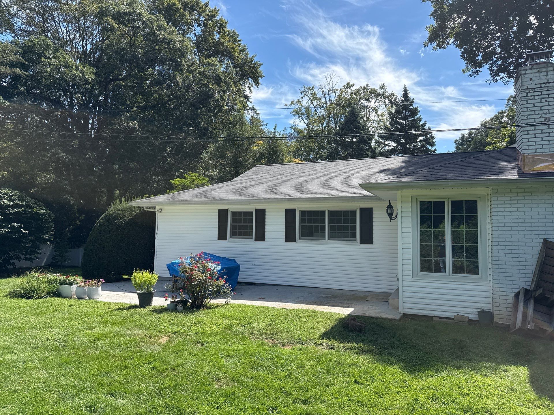 Asphalt Shingle Roof Replacement and Copper Chimney Flashing in Locust Valley by Smart Choice Contracting