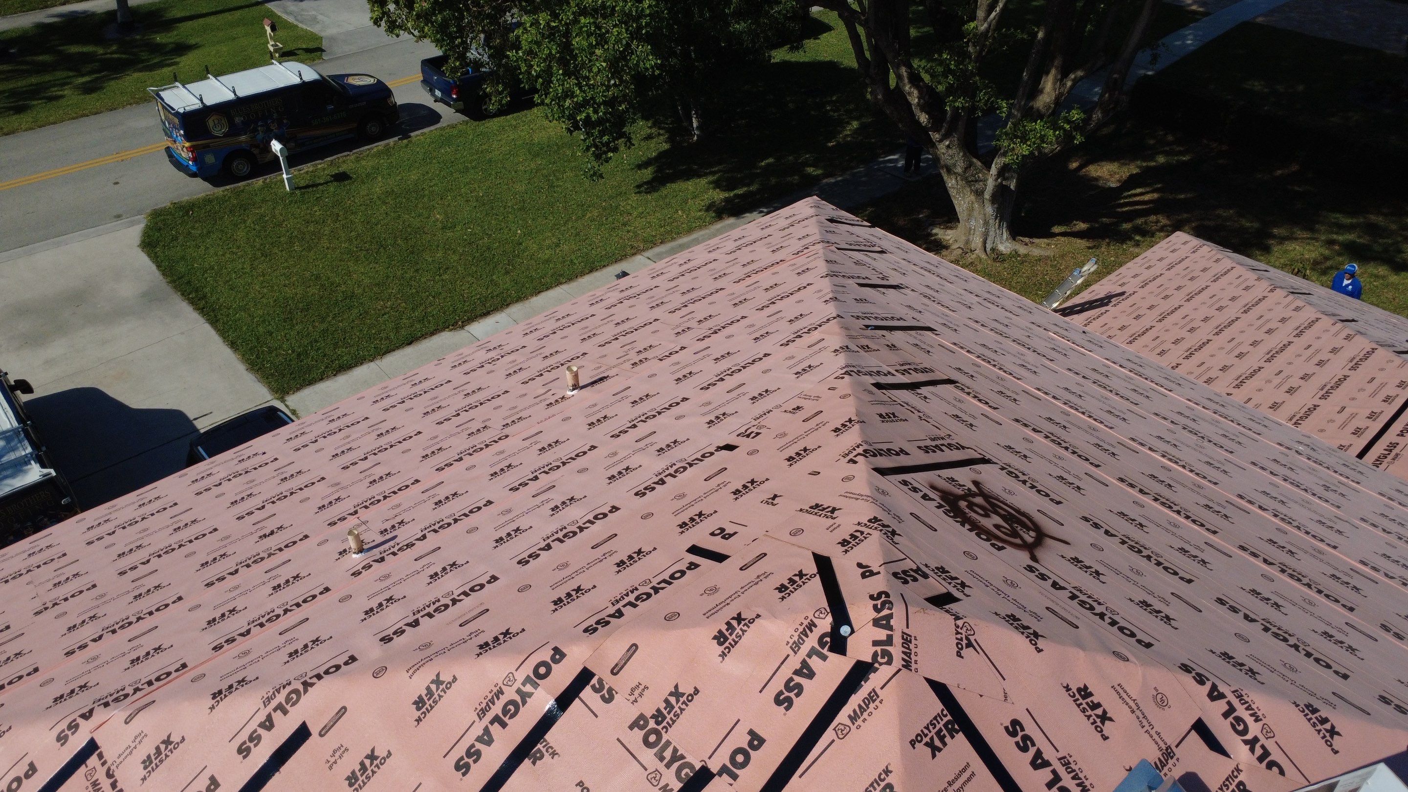 Residential Roofing Installation using 1.5'' Mechanical Seam by BLUES BROTHERS ROOFING