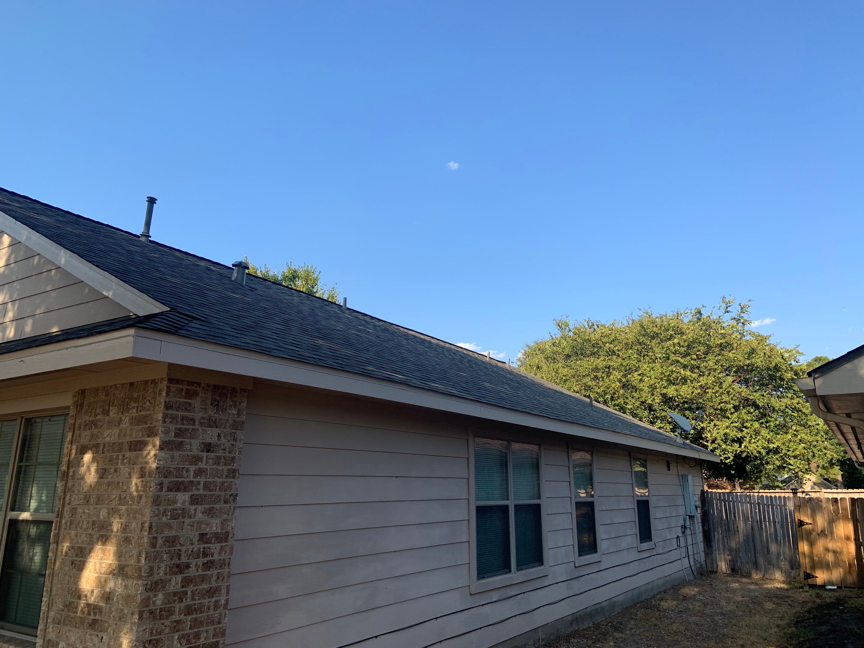 AMIG approved this roof for wind damage, fascia painting, and window work. by Roof Repair Services LLC