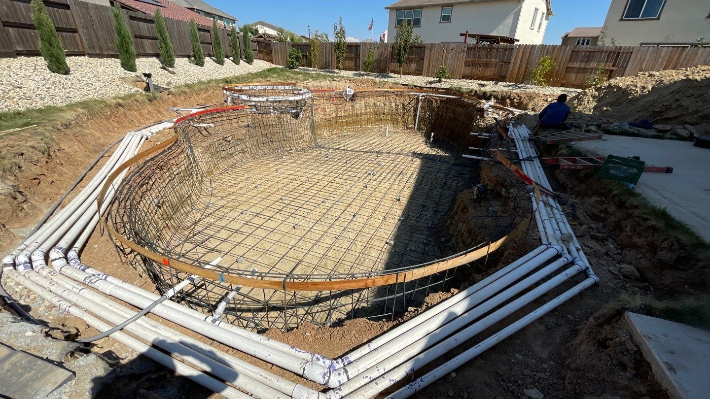 New Pool and Spa with Iridescent Blue Tile in Roseville by Dolphin Pools and Spas