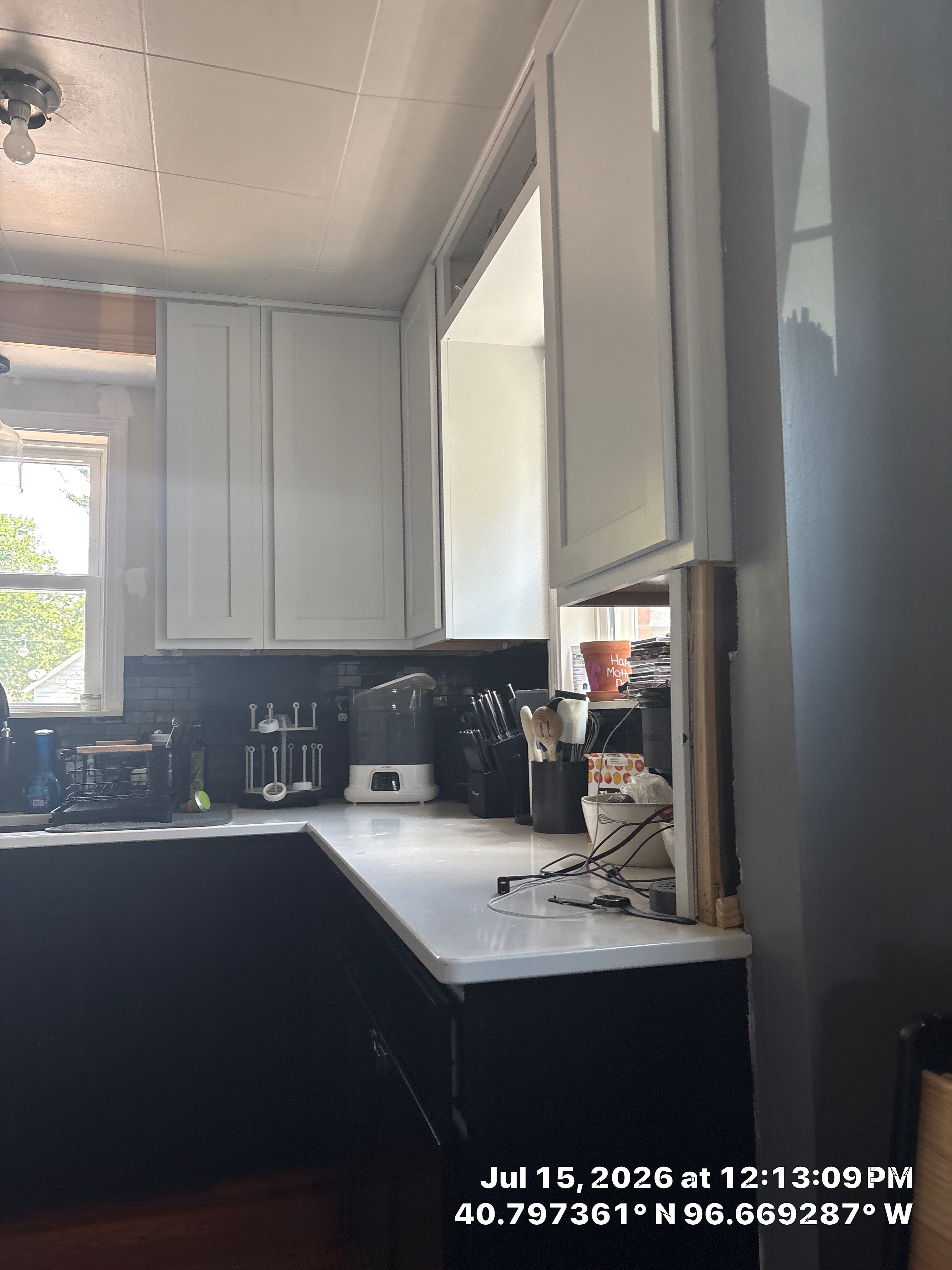Modern Lincoln Kitchen Renovation Featuring Matte Black and White Cabinetry by CompanyCam Sales Demo