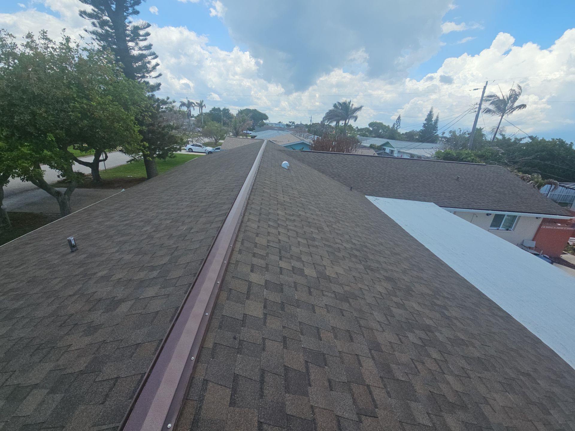 Architectural Shingle Roof Replacement and Deck Repair in Cocoa Beach by Wiedmann Construction & Roofing