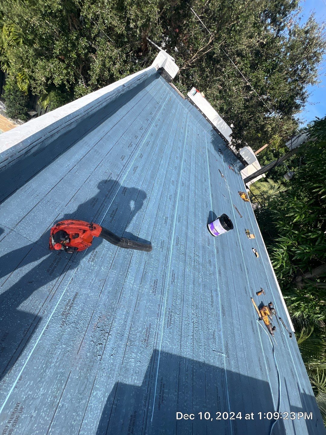 West Palm Beach Roof Restoration and Travertine Paver Driveway Installation by Aastro Roofing