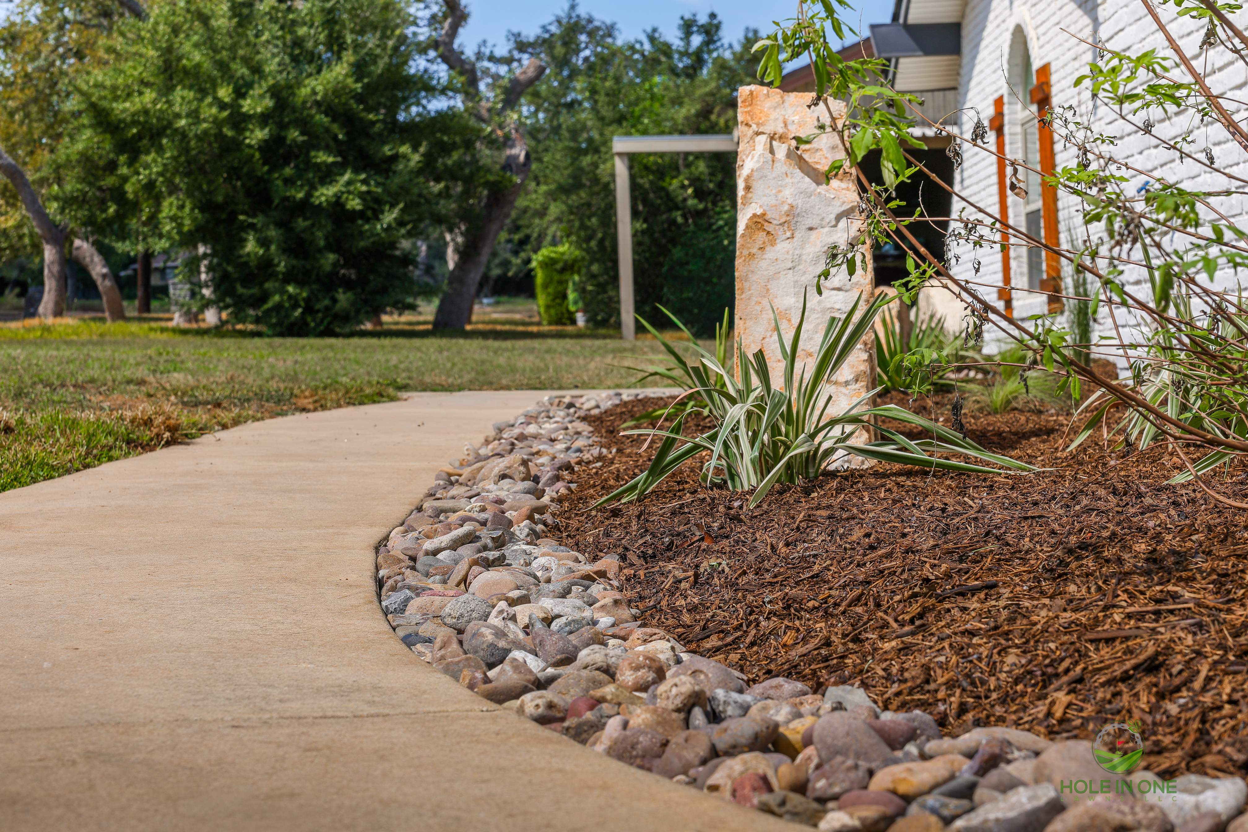Front Paver Patio, Laredo Rock & Xeriscape Beds | Hollywood Park, San Antonio TX by Hole In One Lawns, LLC
