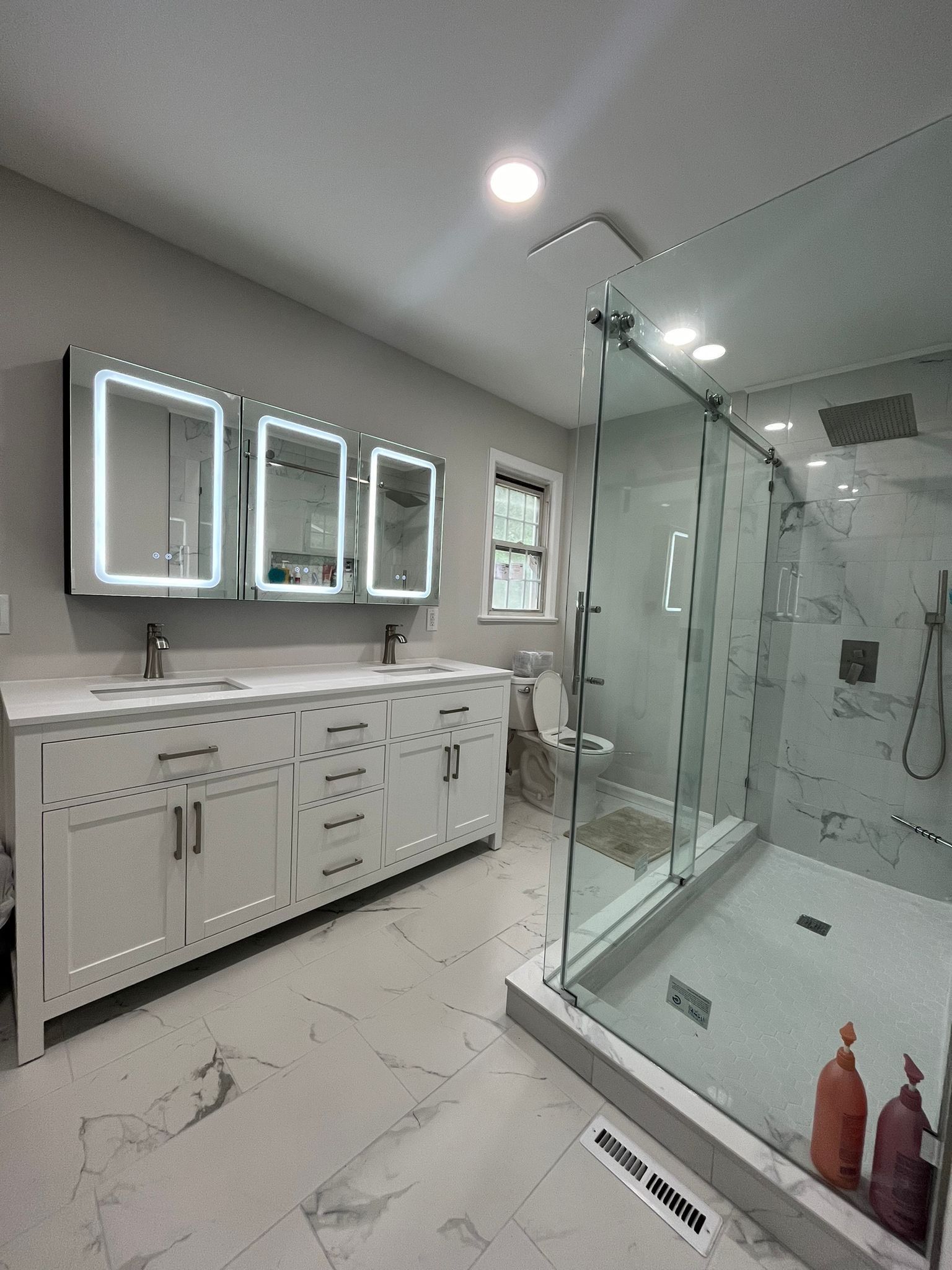 Bathroom Remodel using Tile by Home Concepts Construction