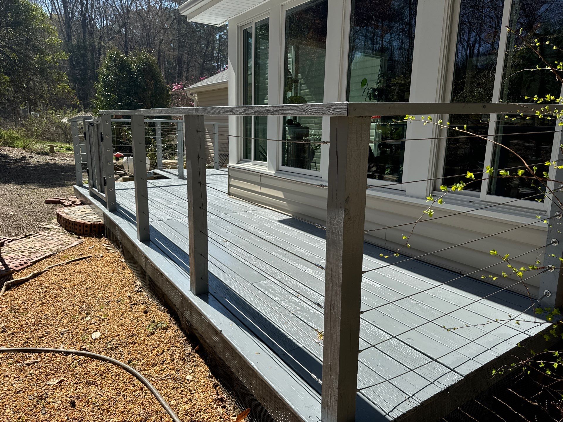 Deck staining by GonzalezPainters & Contractors Inc 