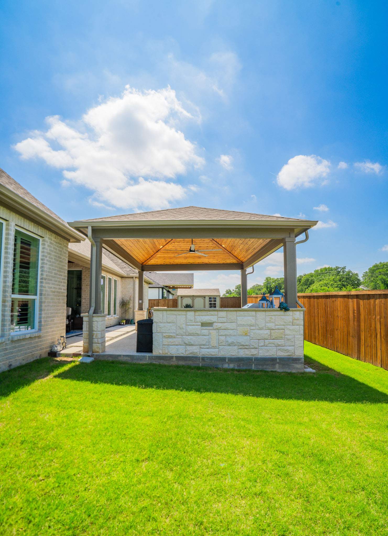 Backyard Hub: Structure & Style by Complete Exterior Solutions