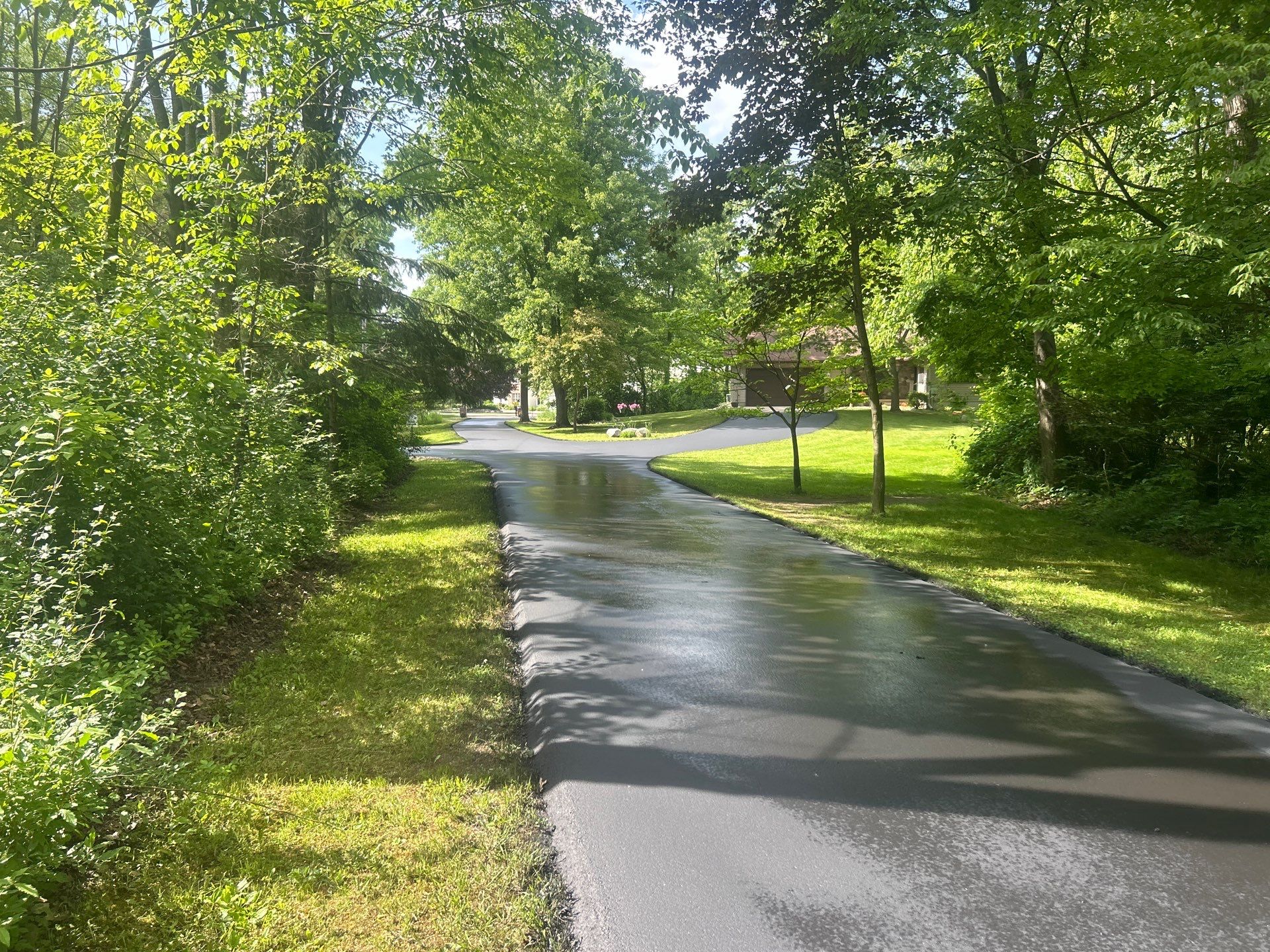 High end residential driveway by Quality Asphalt & Maintenance LLC