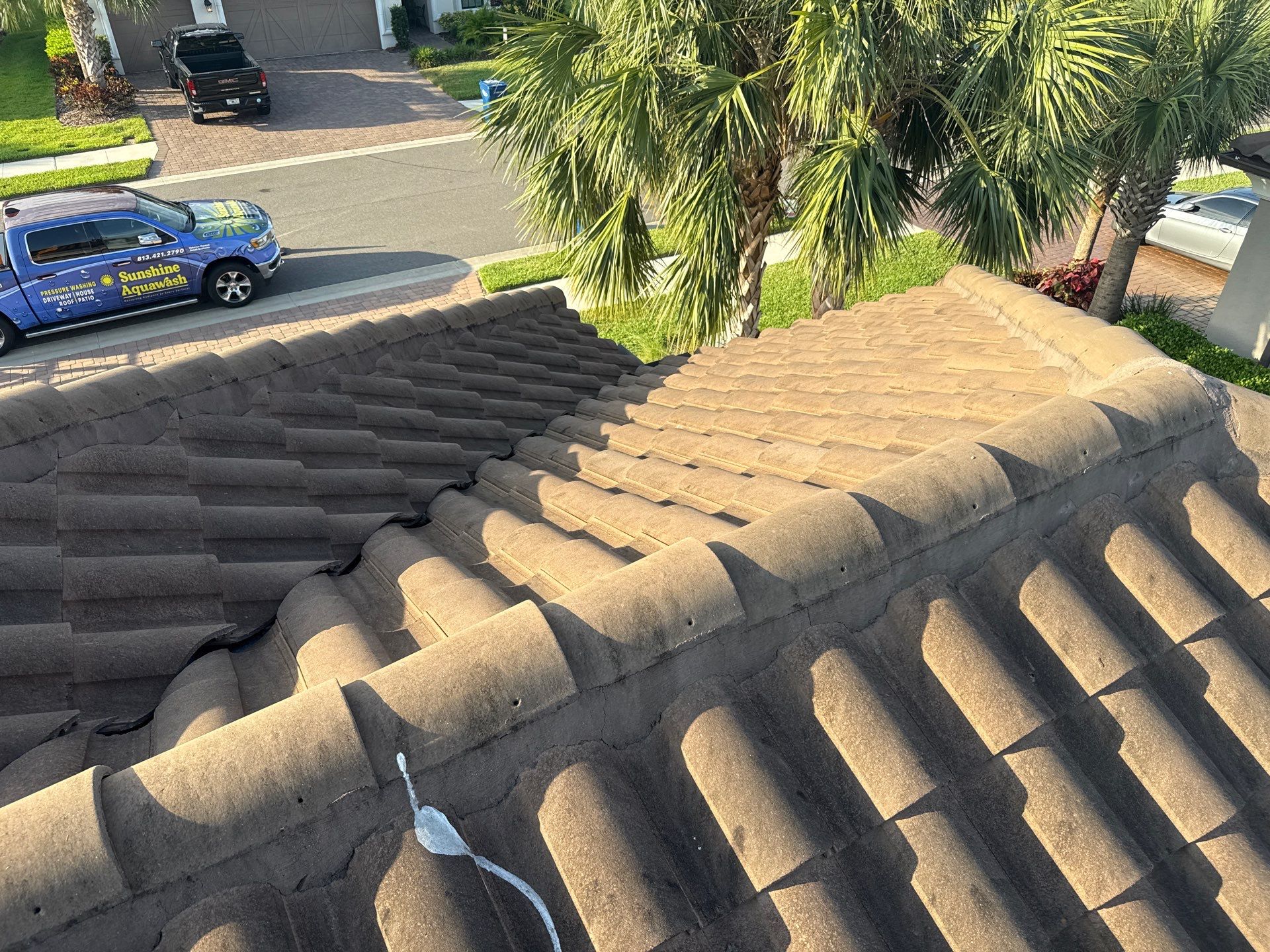Soft Wash Roof Cleaning – Concrete Tile Roof | Artisan Lakes Esplanade, Palmetto, FL by Sunshine AquaWash