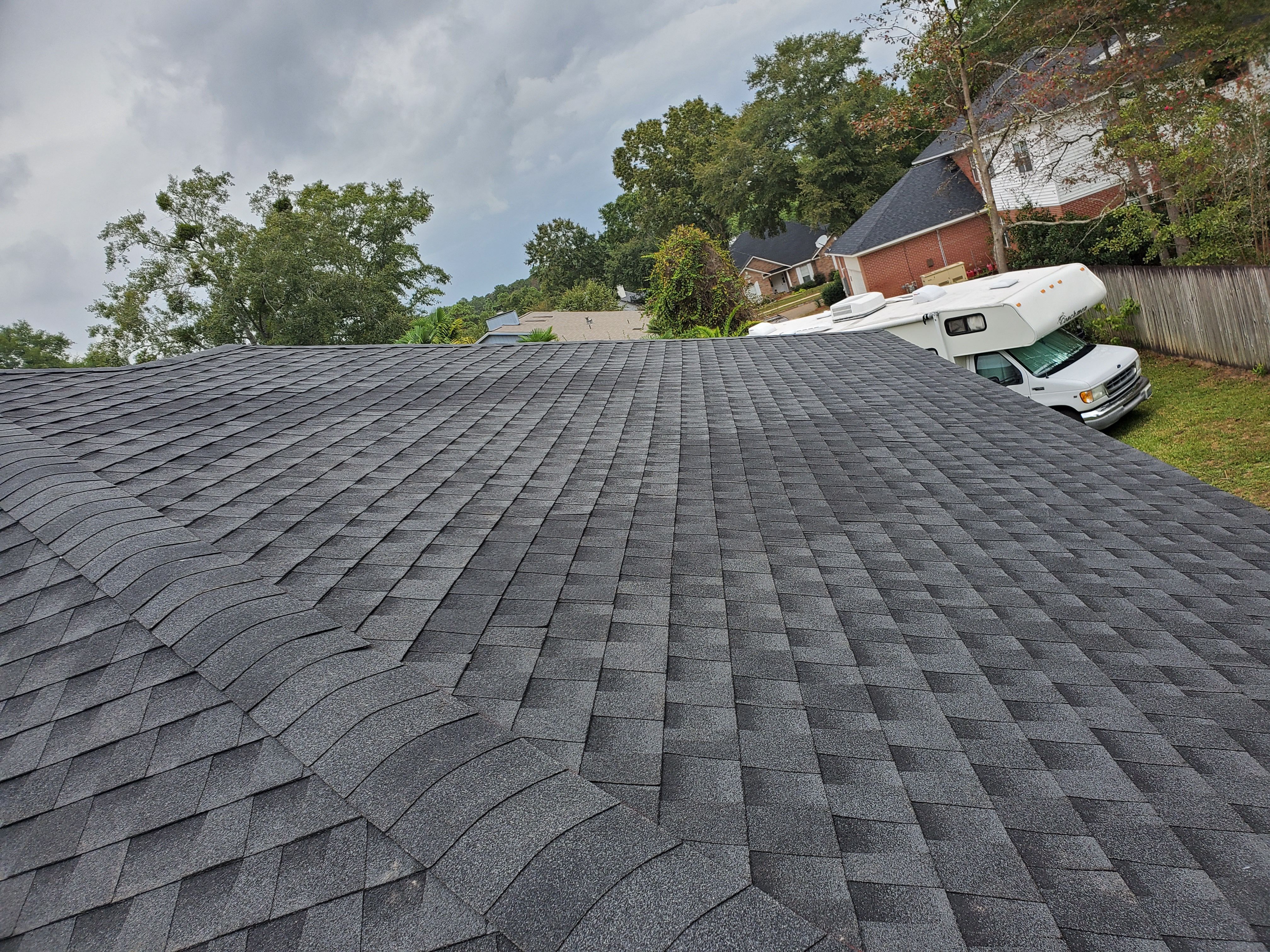 Residential Roofing Installation using Roof Replacement by American Roofing & Construction LLC
