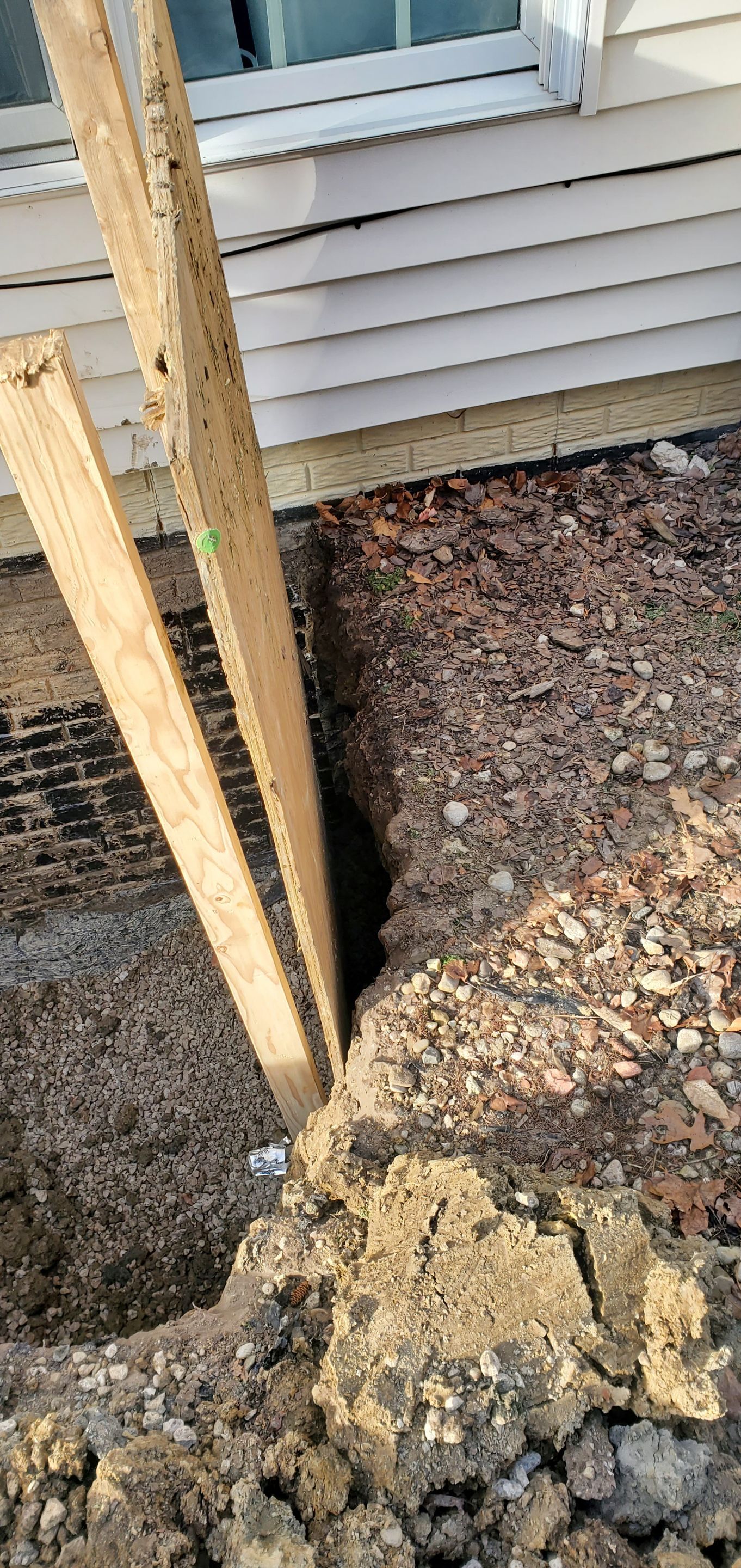 Egress Window Installation using Rockwell Egress Fiberglass Egress Window Well by Toledo Basement Repair 