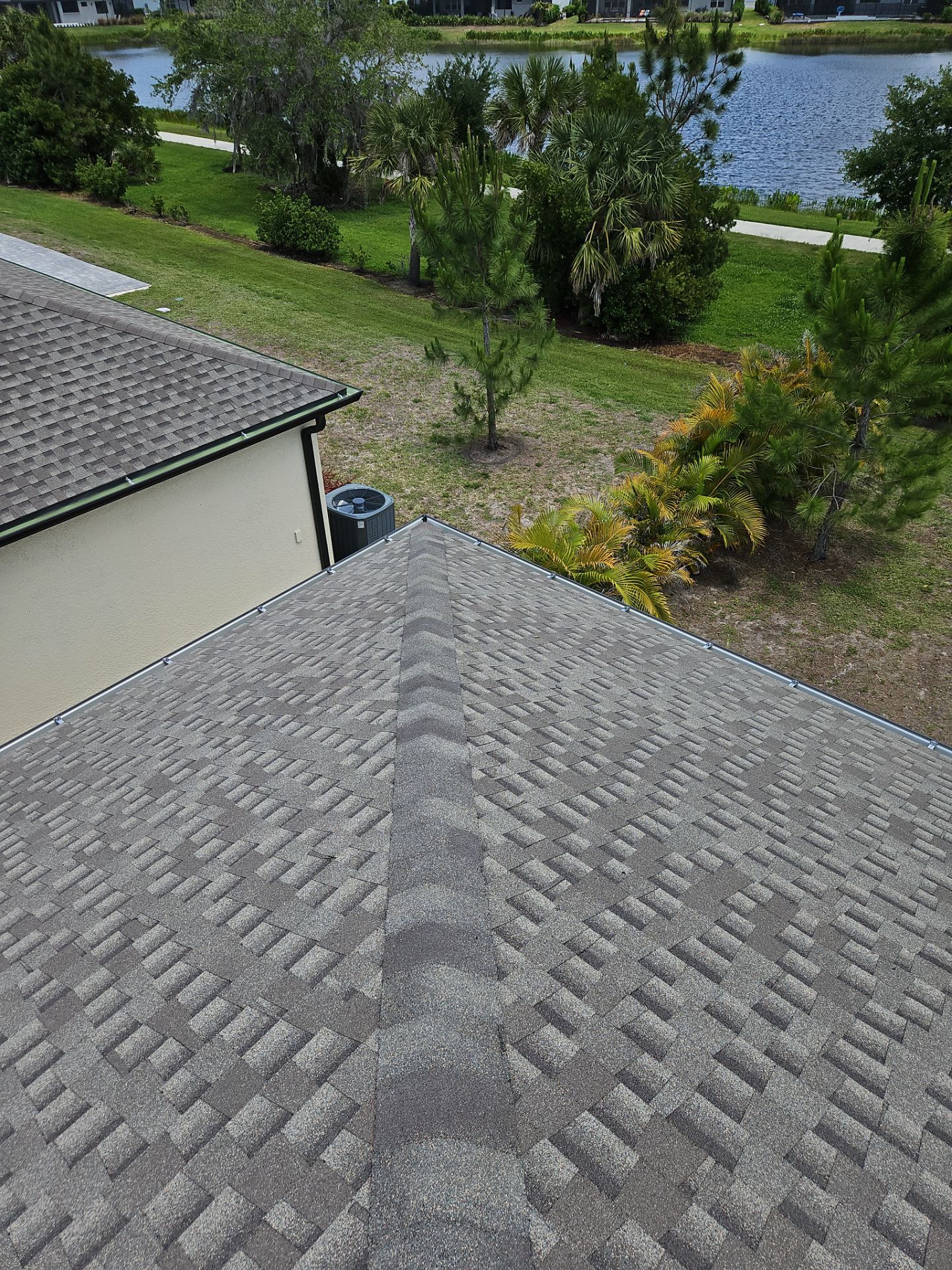 K-Style Seamless Gutter Installation using bronze gutters in Sarasota FL by Gutter Professors