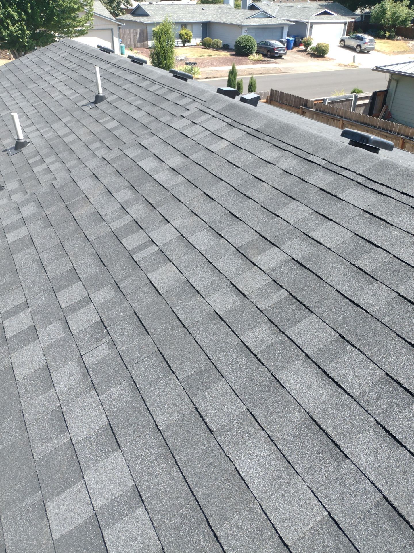 Residential Roofing Installation using IKO Dynasty (Color: Granite Black) by Orezona Building & Roofing Company, Inc.