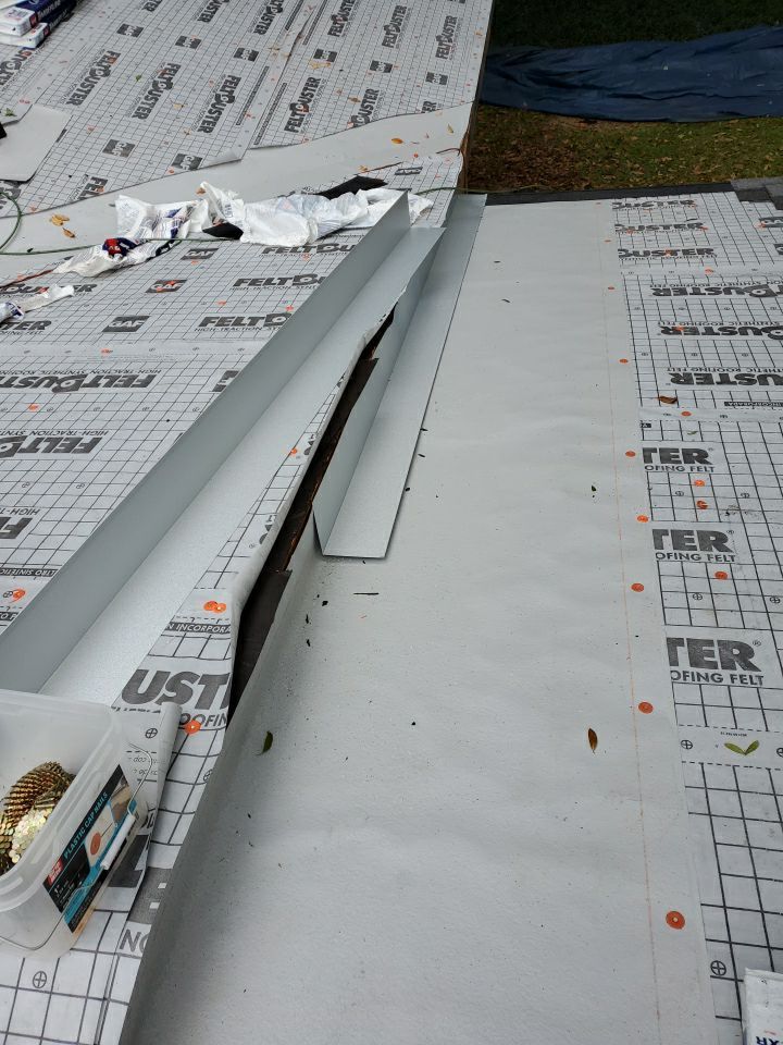 Residential Roofing Installation using Roof Replacement by American Roofing & Construction LLC