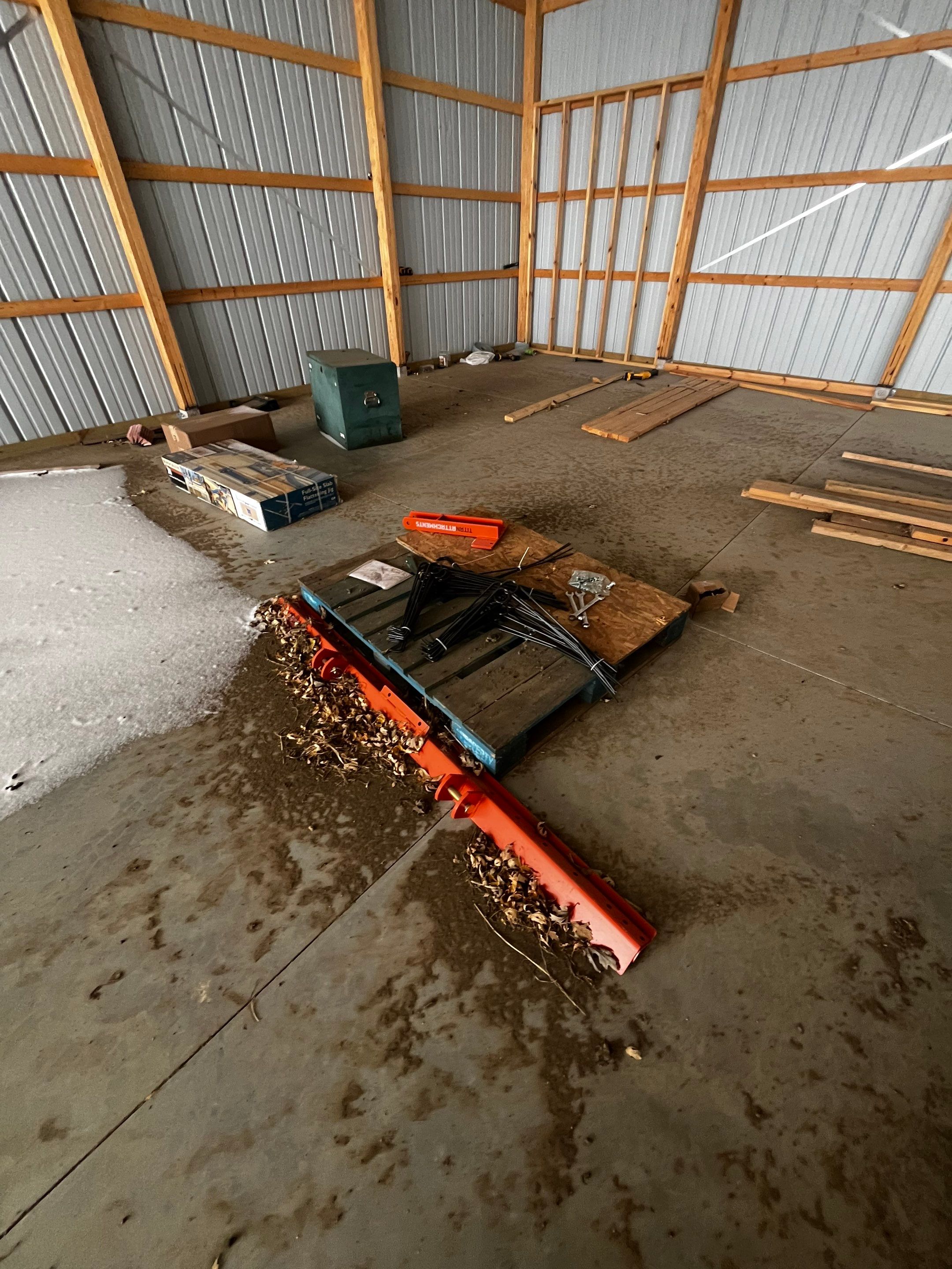 Durable Grey Speckled Epoxy Floor Coating for Yankton Shop by Select Painting, Coatings & Garage Cabinets